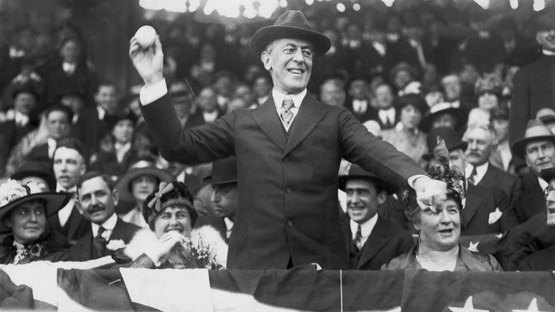Woodrow Wilson throws baseball