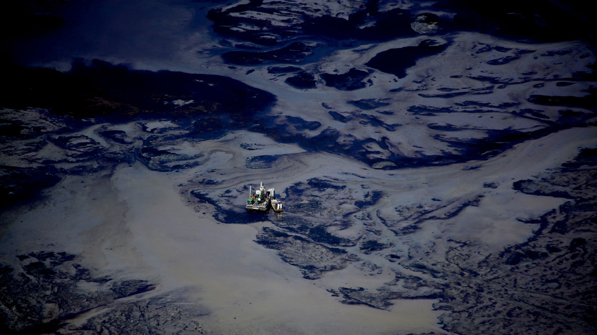 Photo of oil sands tailing pond in Alberta