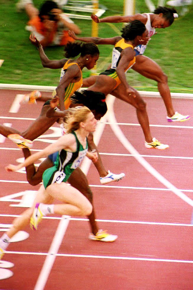 Gail Devers crossing the finish line