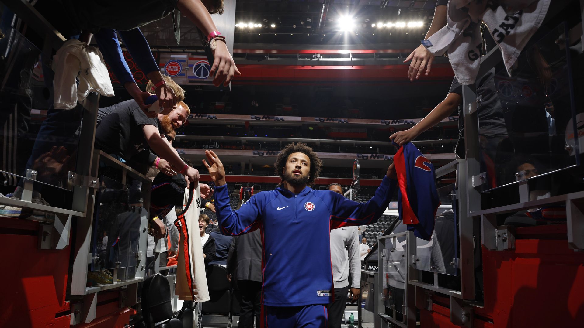Cade Cunningham greets fans after a preseason game against Washington last week at Little Caesars Arena.