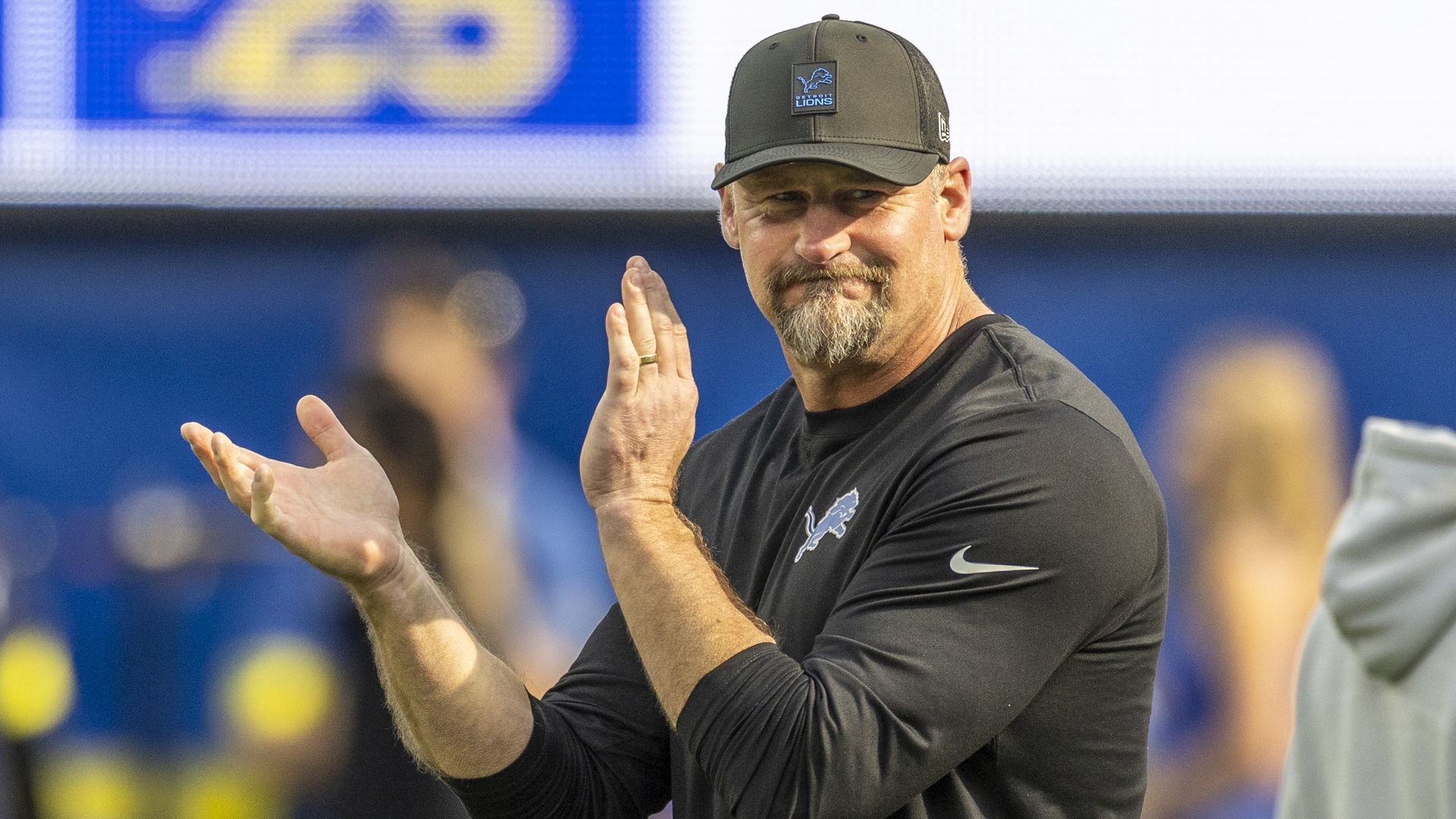 Lions head coach Dan Campbell cheers before last season's game against the Rams. 