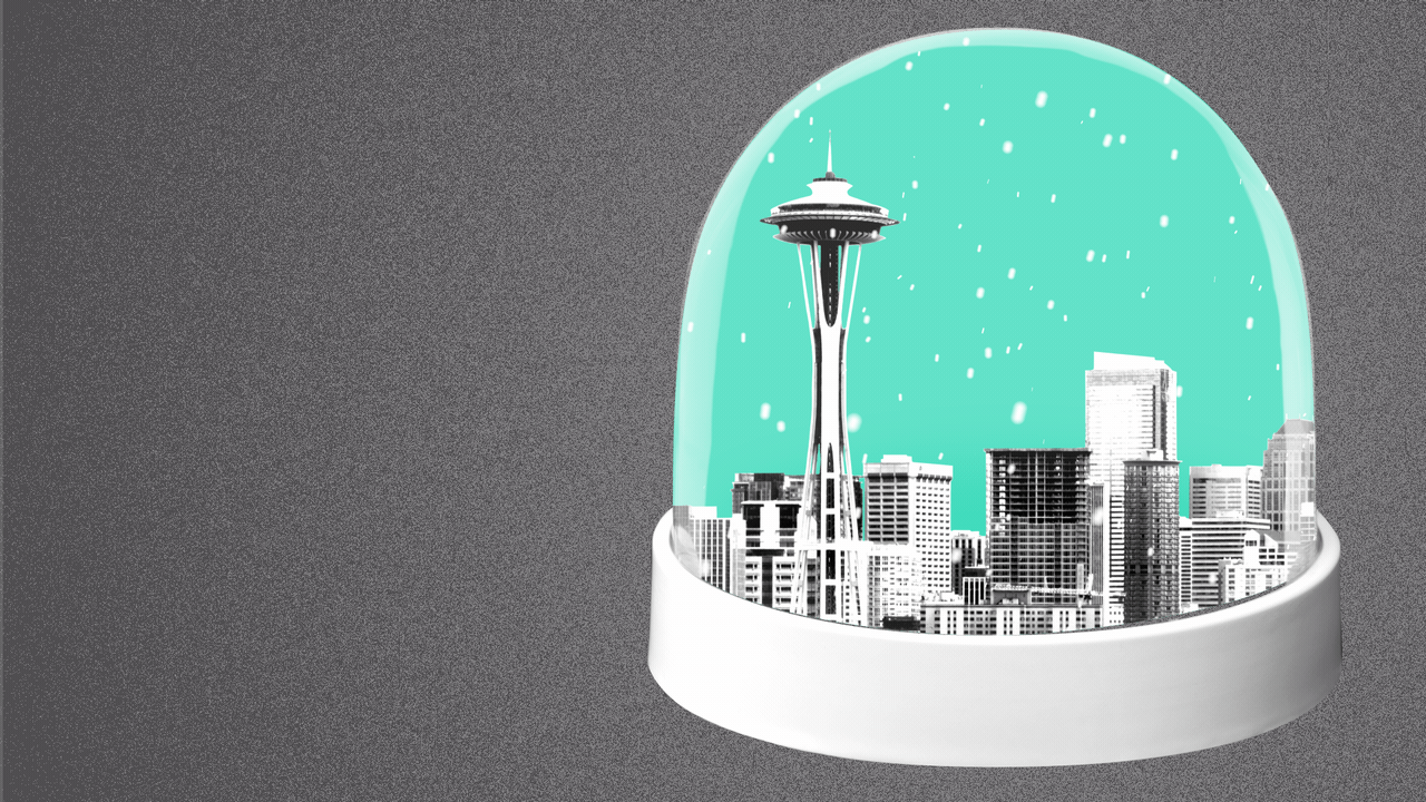 Illustration of the Seattle skyline in a snow globe with snow falling on it. 