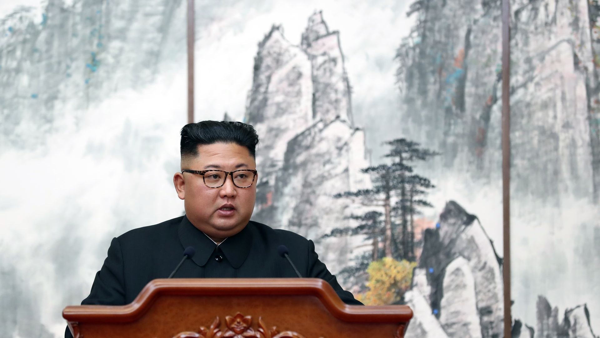 Kim Jong-un standing in front of a podium