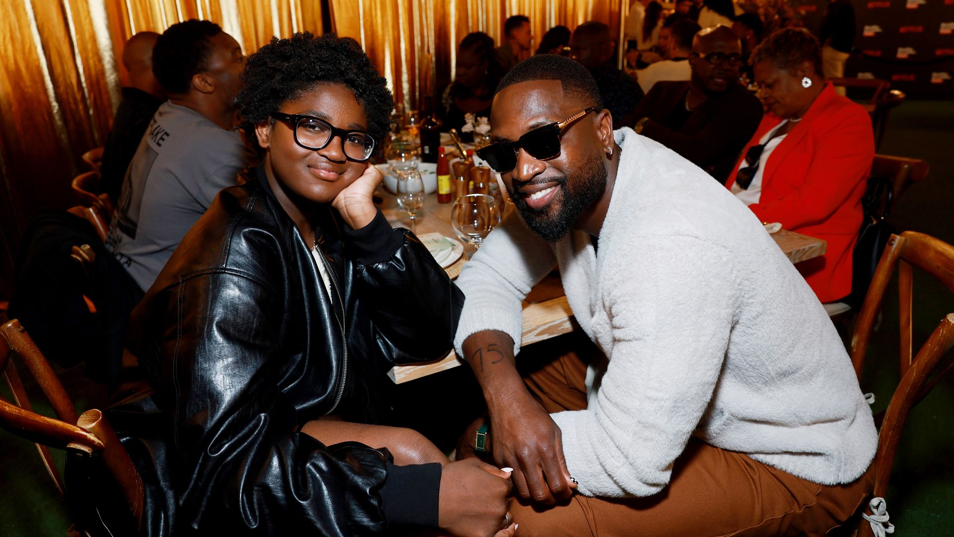 Dwyane Wade (left) with his daughter Zaya 