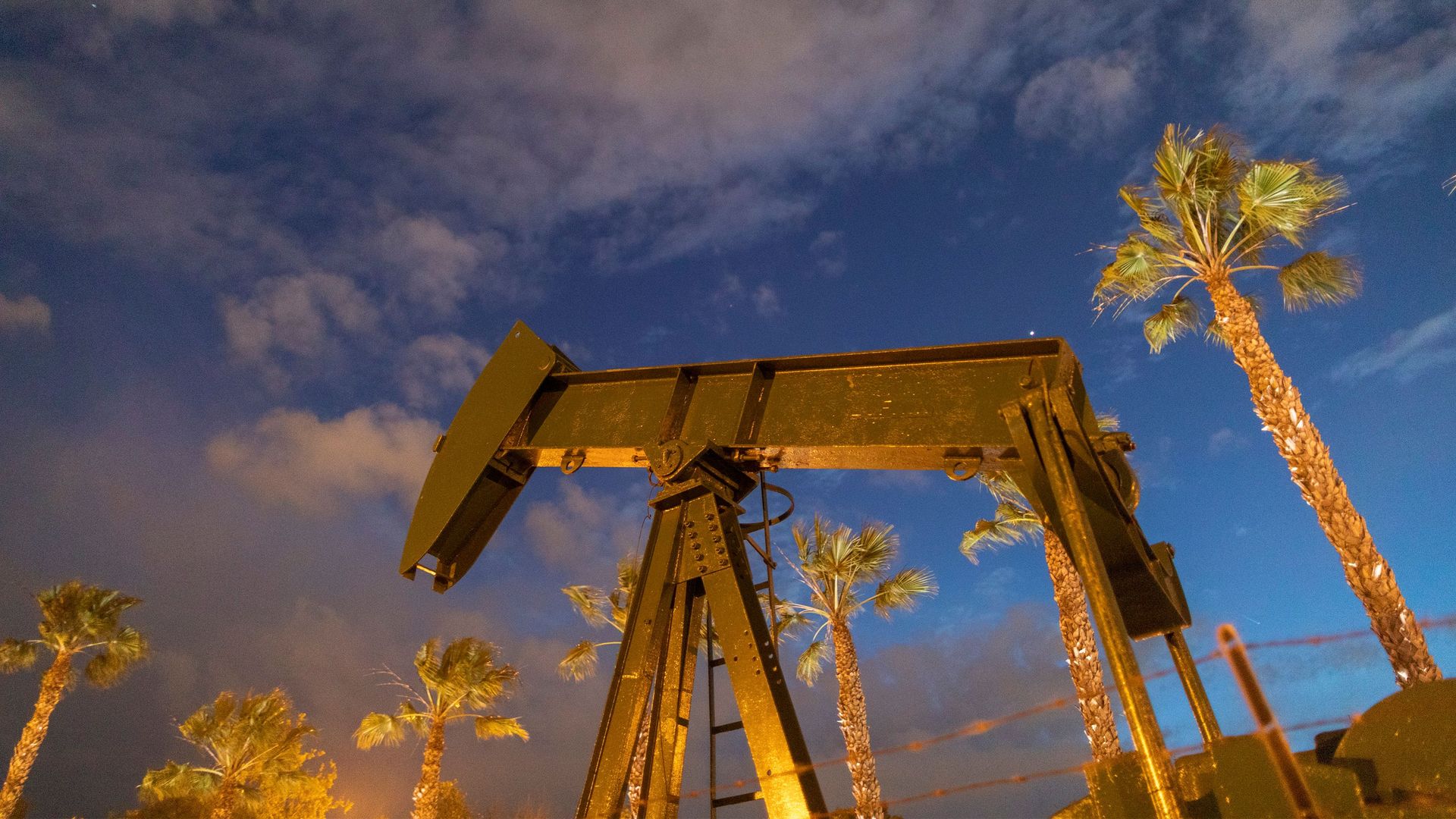 Pump jacks draw crude oil from the Long Beach Oil Field under Discovery Well Park in Signal Hill, California, on March 9
