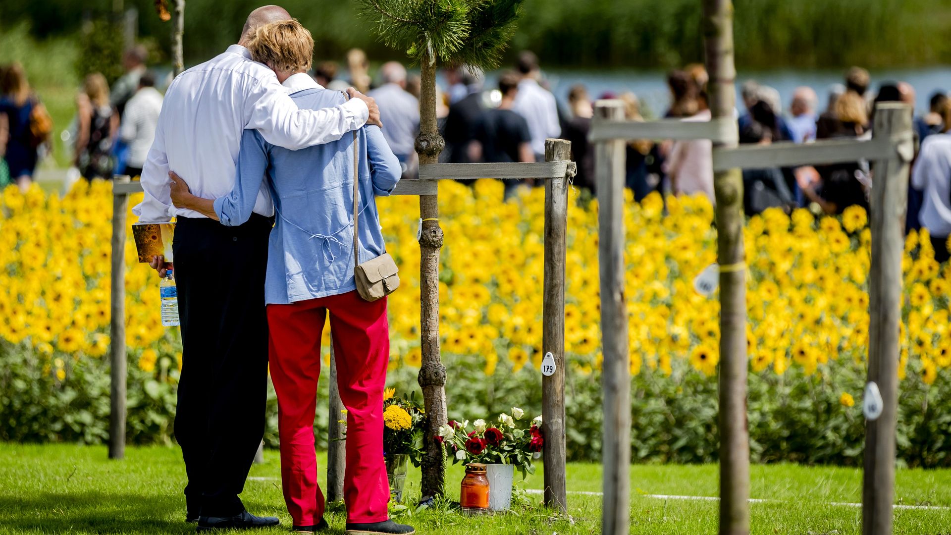 Relatives of MH17 victims mourn at the memorial site