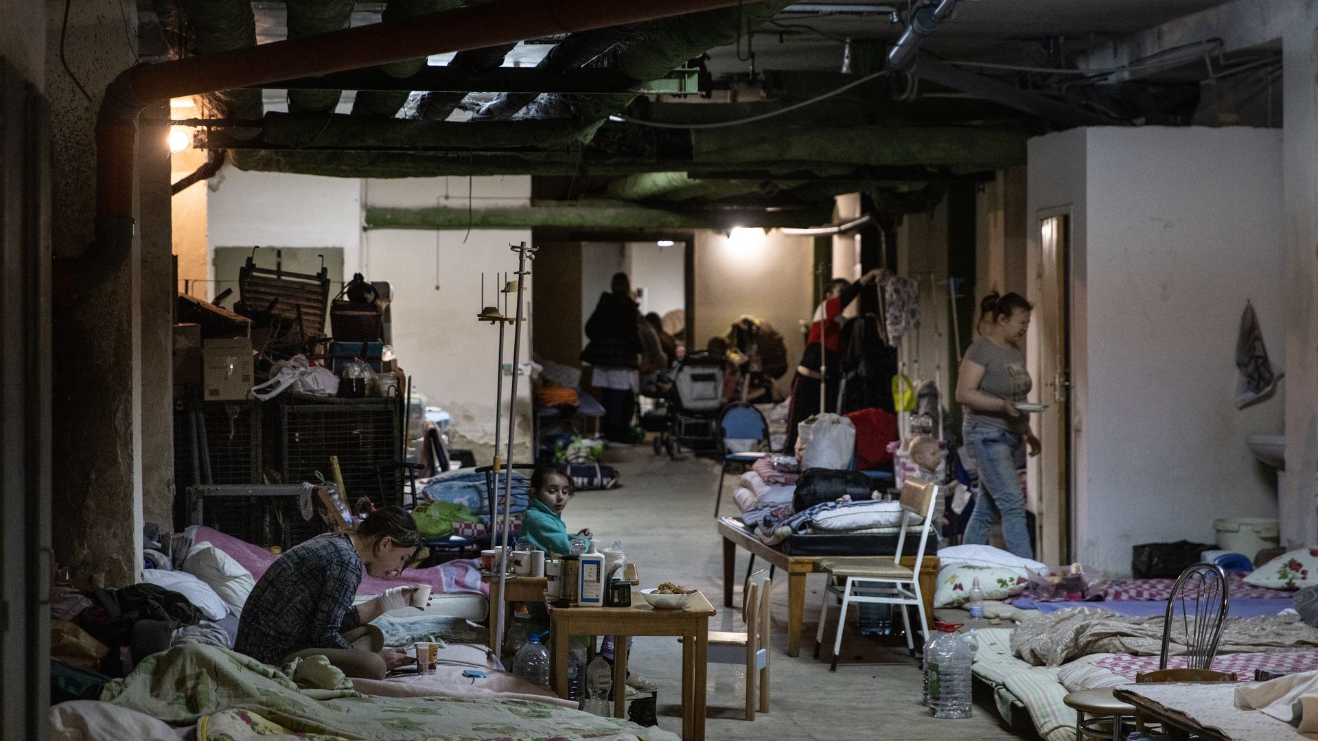 Picture of a bomb shelter with beds on the floor