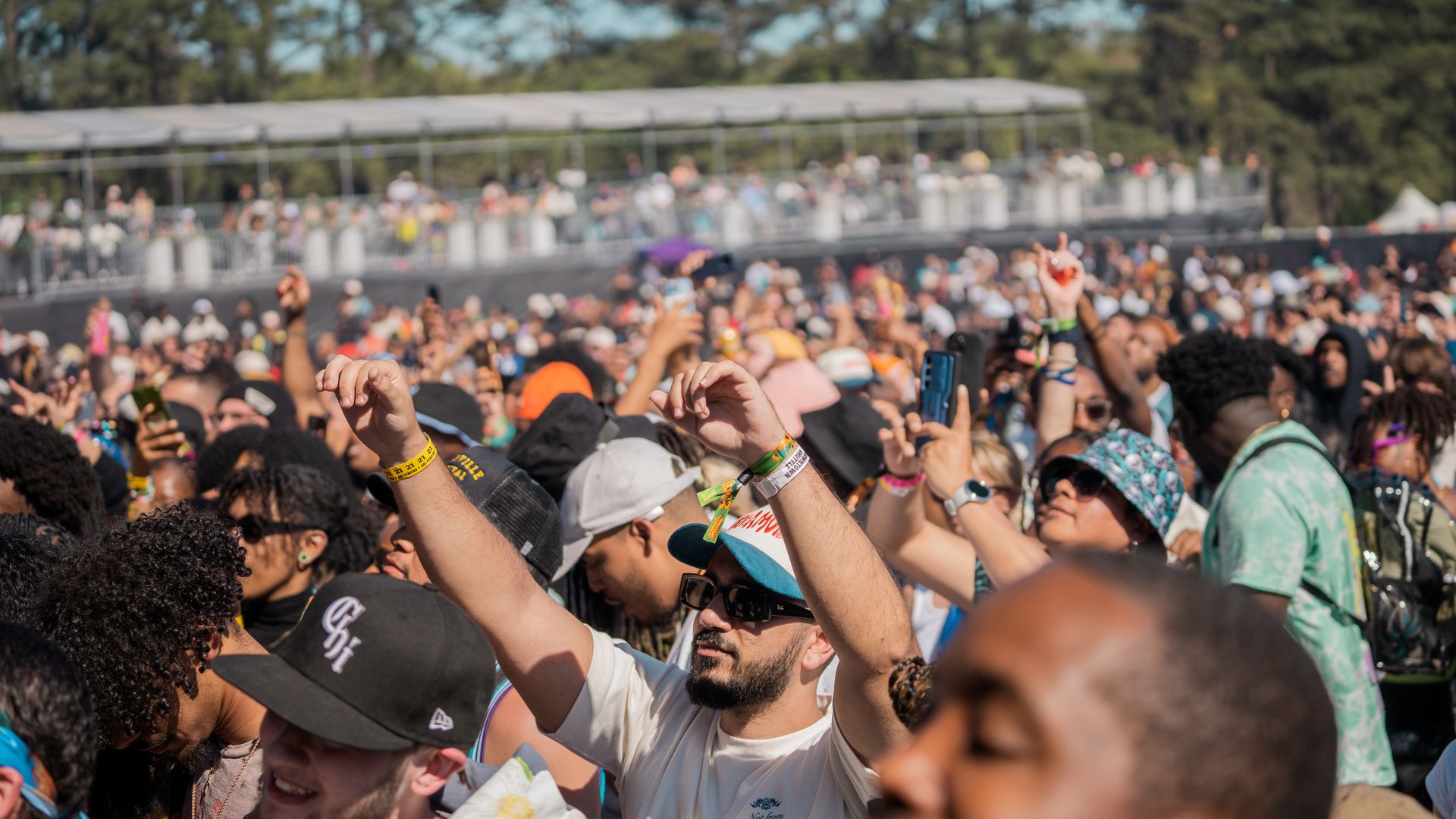 Attendees at Dreamville Music Festival held at Dorethea Dix Park on April 2, 2023 in Raleigh, North Carolina. (Photo by Samuel La'Guerre/VIBE via Getty Images)
