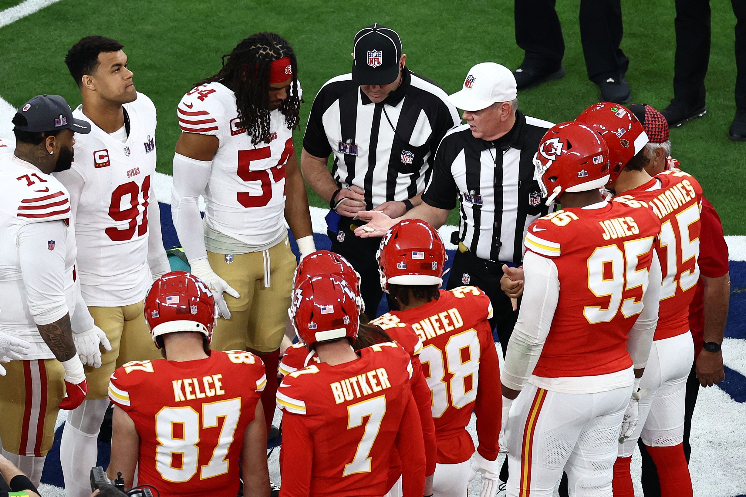 Captains for the Kansas City Chiefs and San Francisco 49ers lineup for the coin toss prior to Super Bowl LVIII at Allegiant Stadium on February 11, 2024 in Las Vegas, Nevada. 
