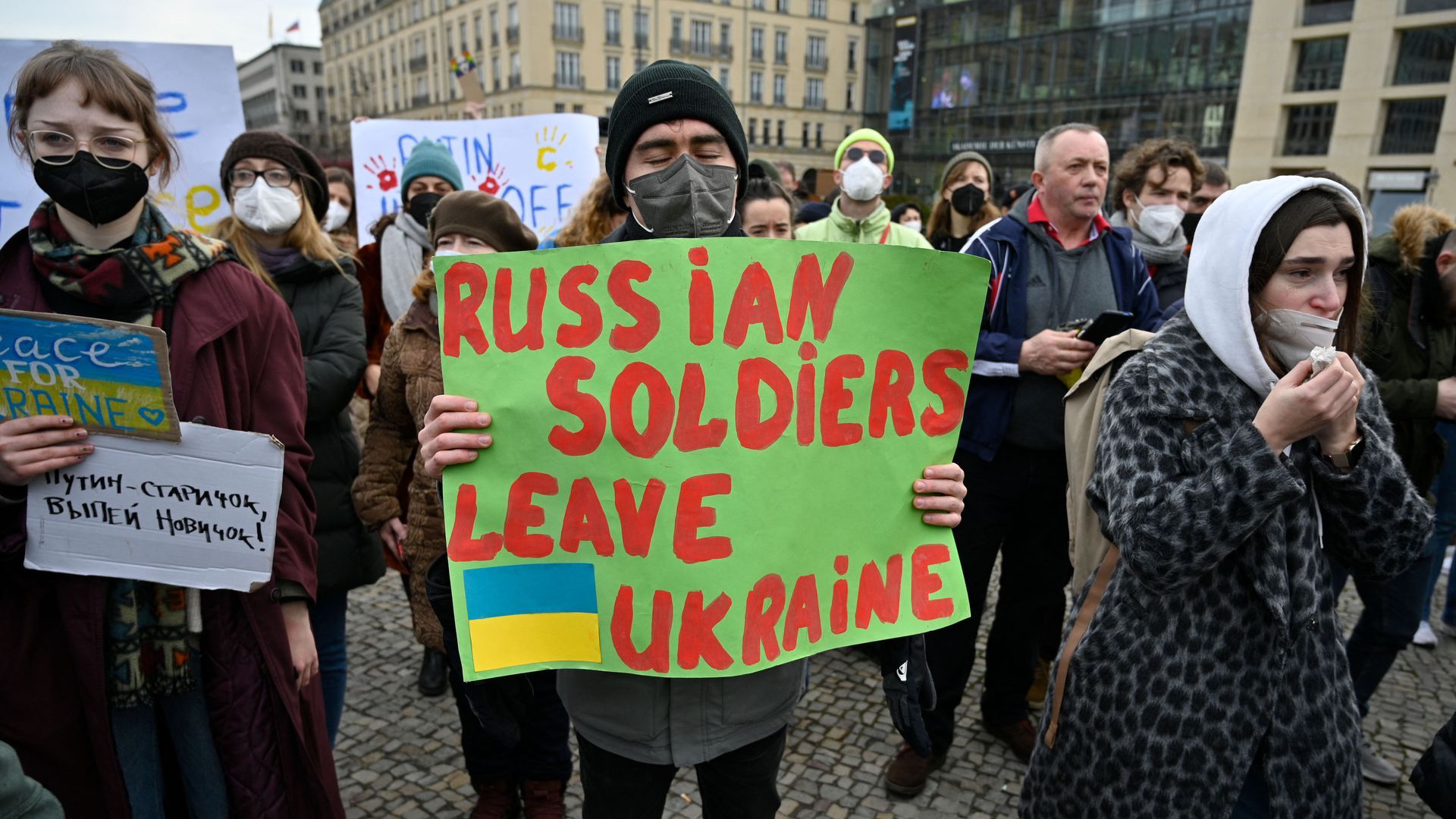 A protest in front of the Brandenburg Gate in Berlin on Thursday. Photo: John Macdougall/AFP via Getty Images