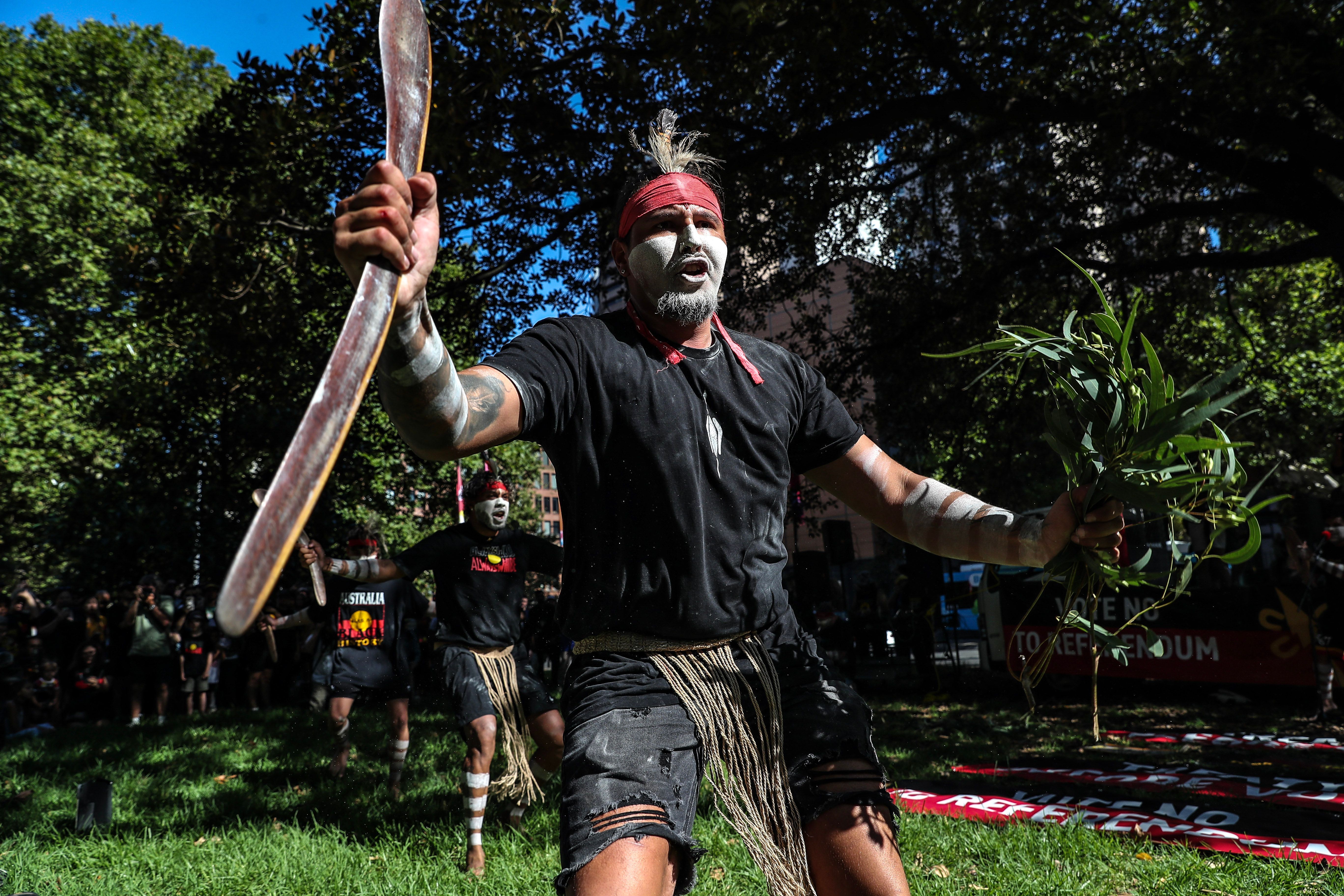 Aboriginal Australians perform a traditional dance during the Invasion Day protest at Belmore Park on January 26, 2023 in Sydney, Australia. 