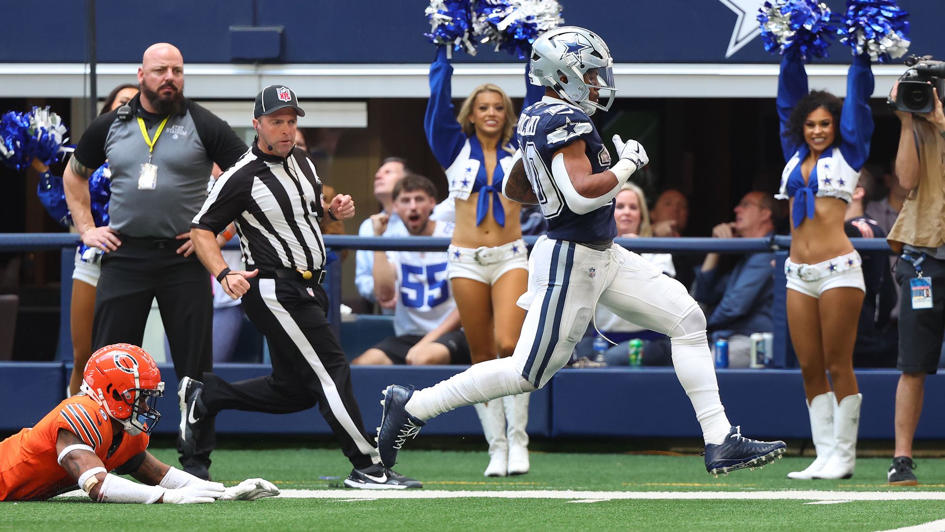 Photo of a football player running