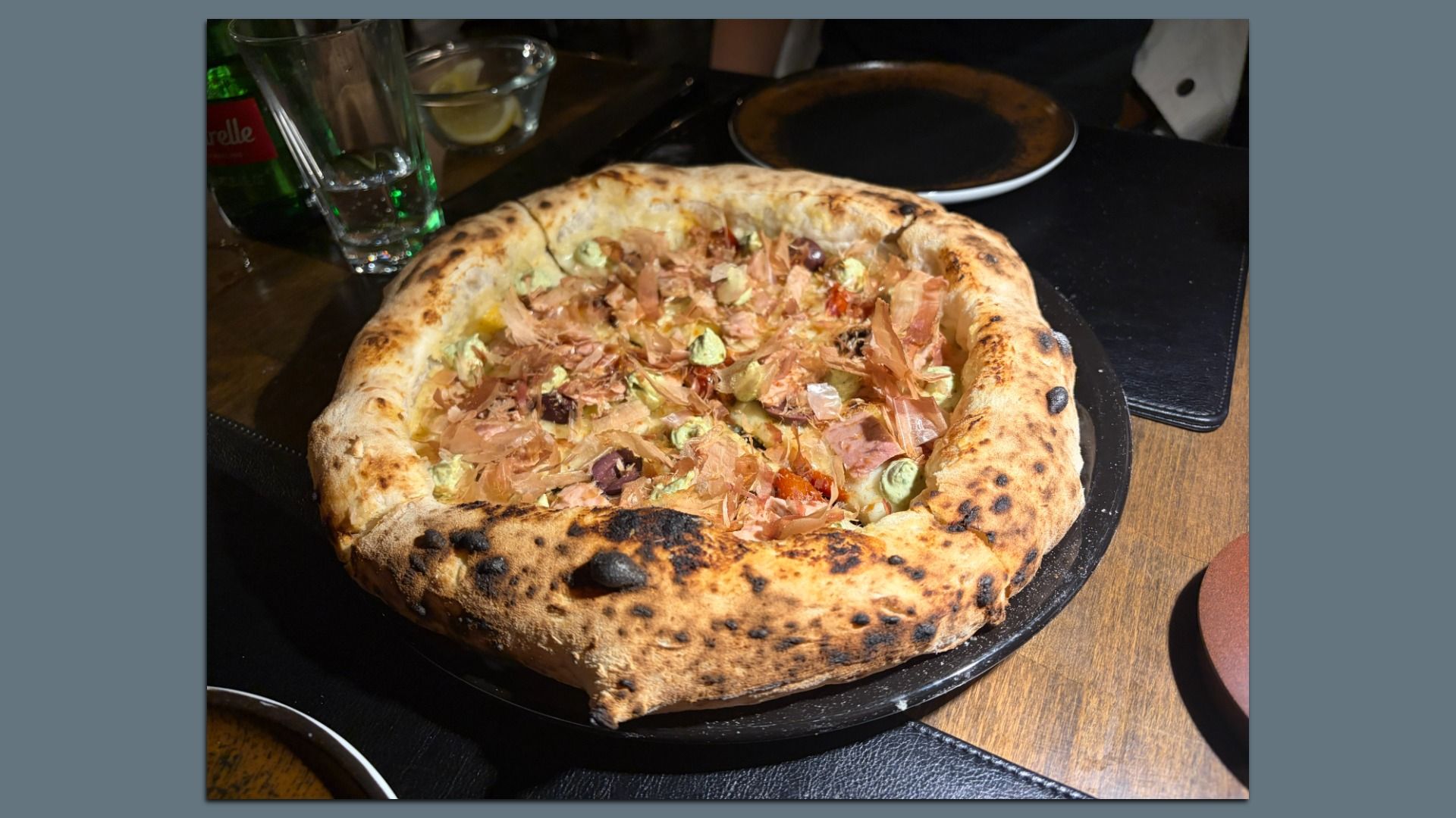 Round, puffed-crust pizza.