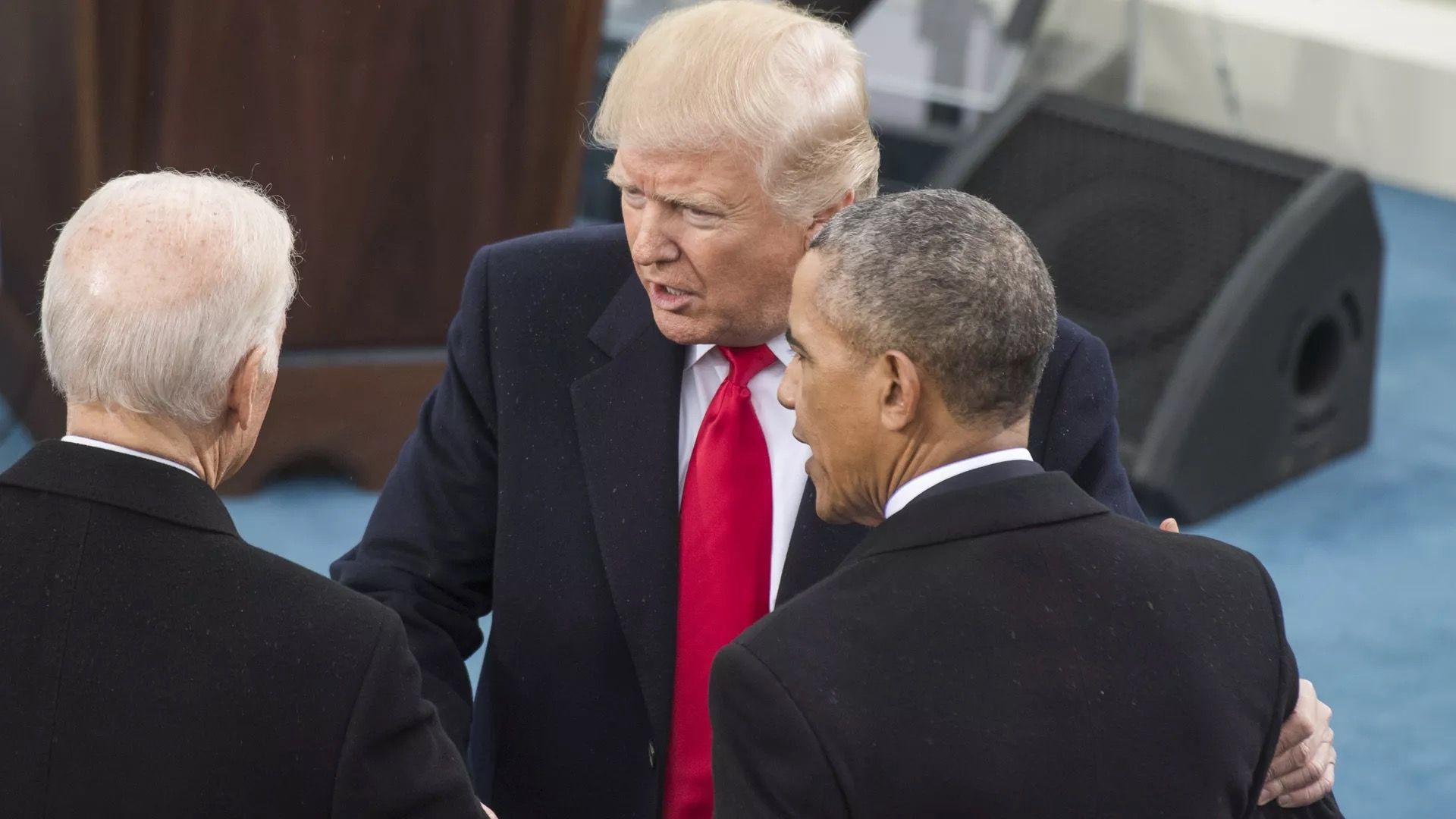 Former President Trump is seen speaking with future President Biden and former President Obama.
