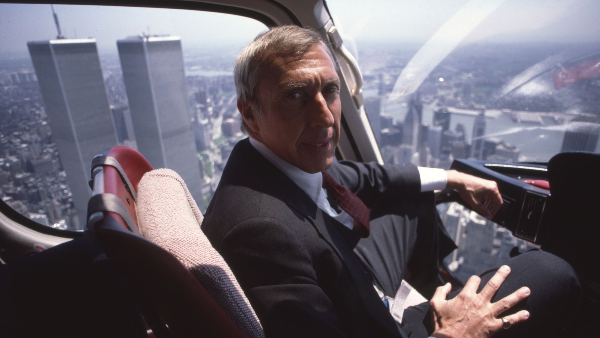 Ivan Boesky in a private plane flying past the World Trade Center