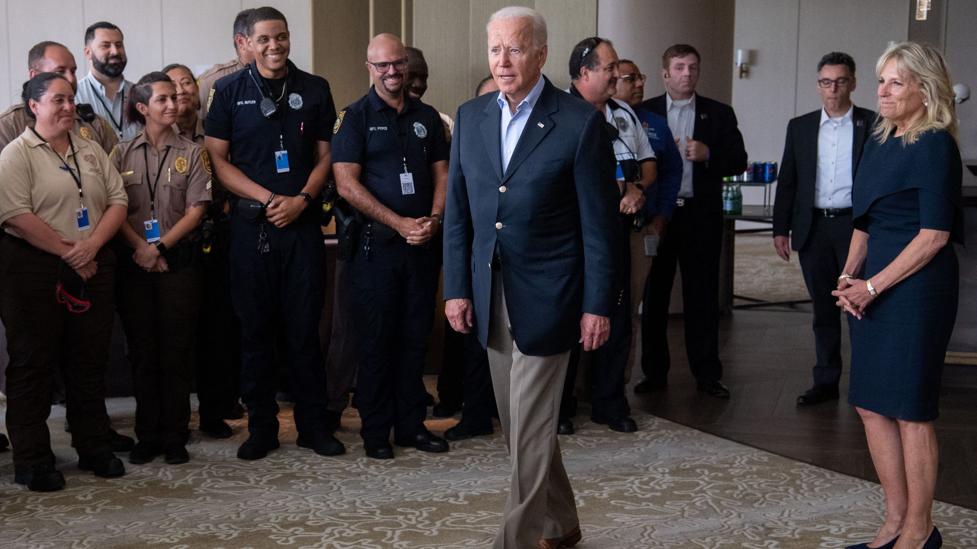 President Biden and first lady Jill Biden are seen speaking with first responders in Sunrise, Fla.