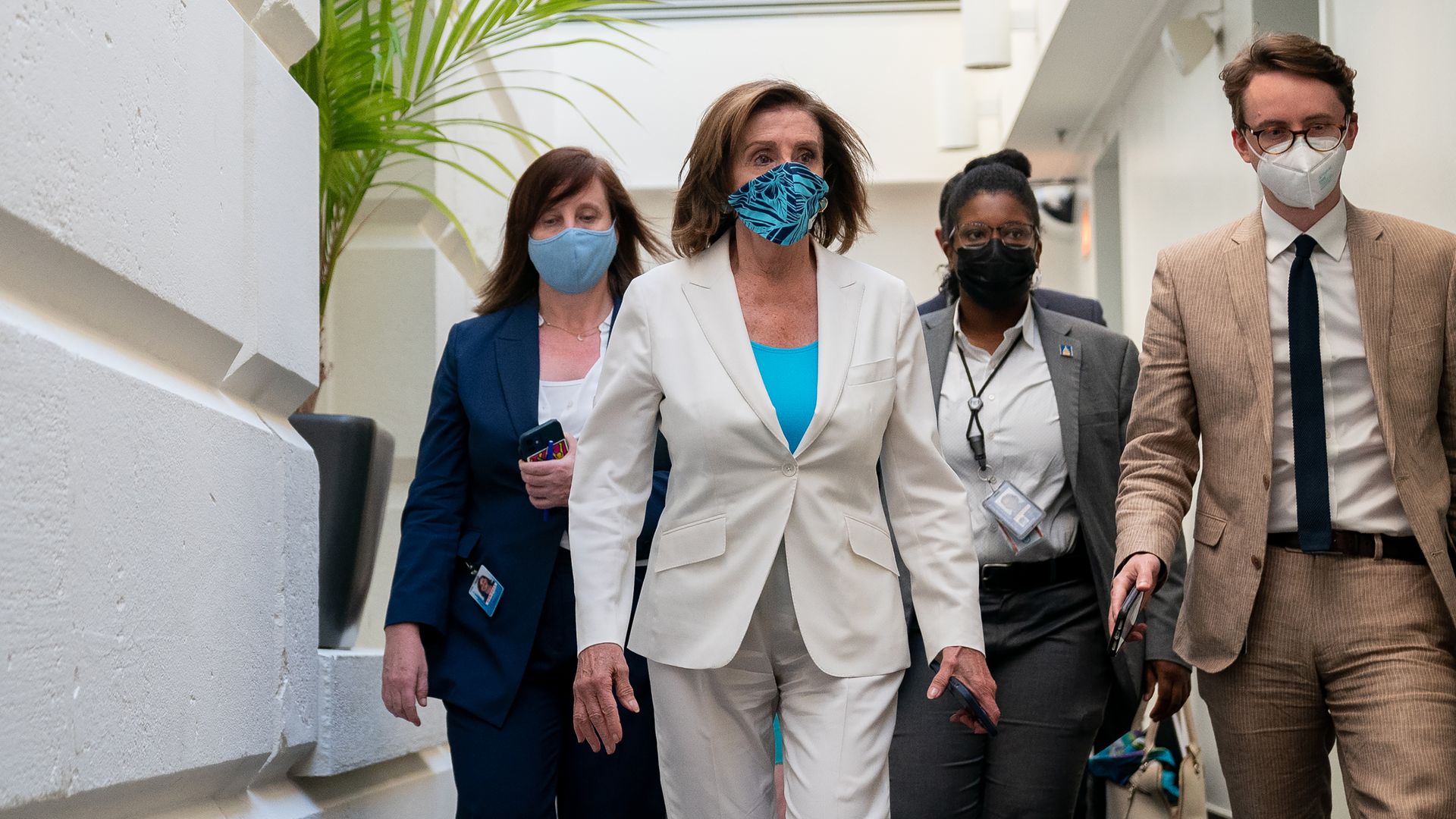 U.S. House Speaker Nancy Pelosi, a Democrat from California, center, departs the House Democratic Caucus meeting at the U.S. Capitol in Washington, D.C., U.S., on Monday, Aug. 23, 2021.