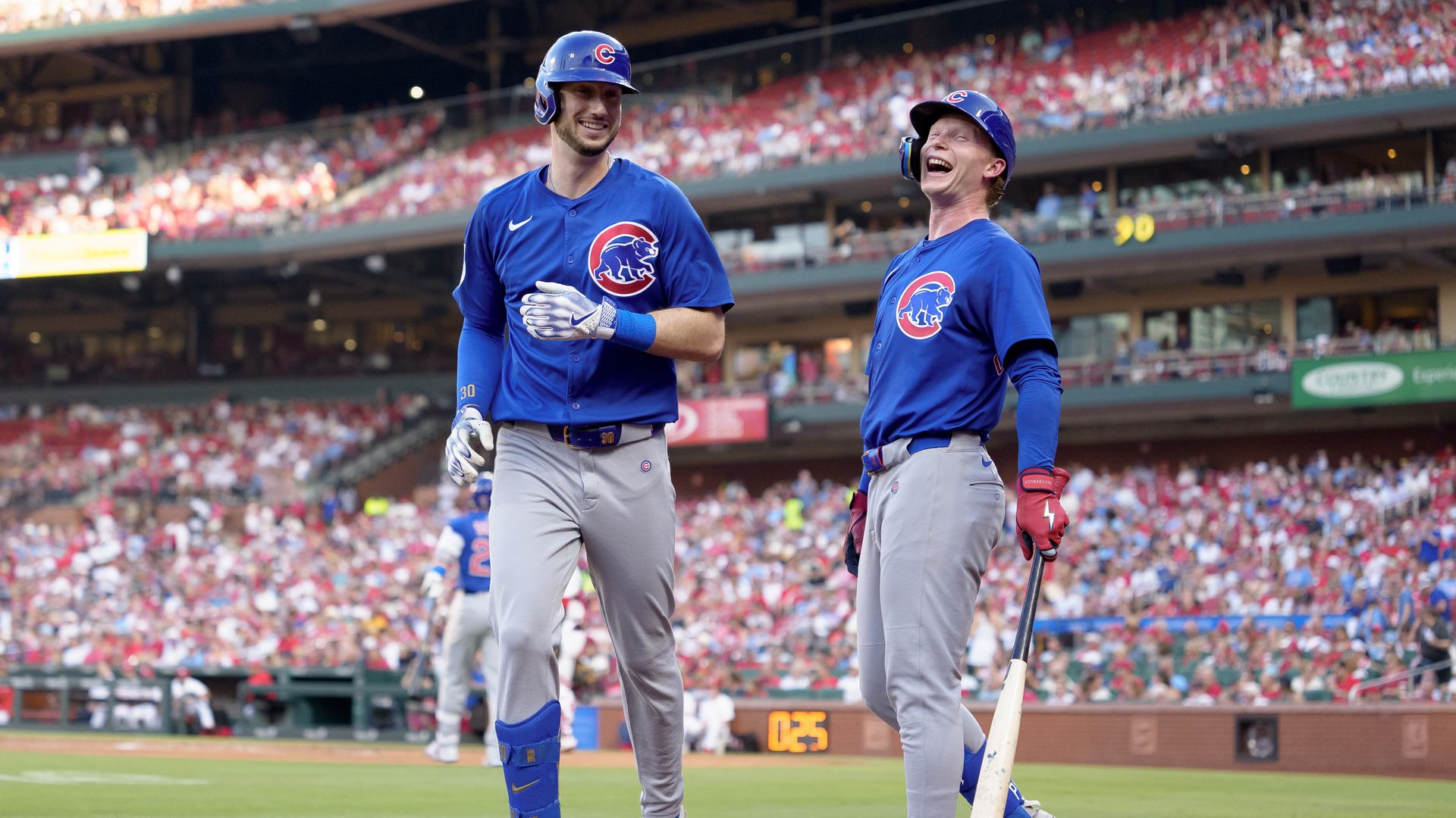 Photo of two baseball players during a baseball game. 
