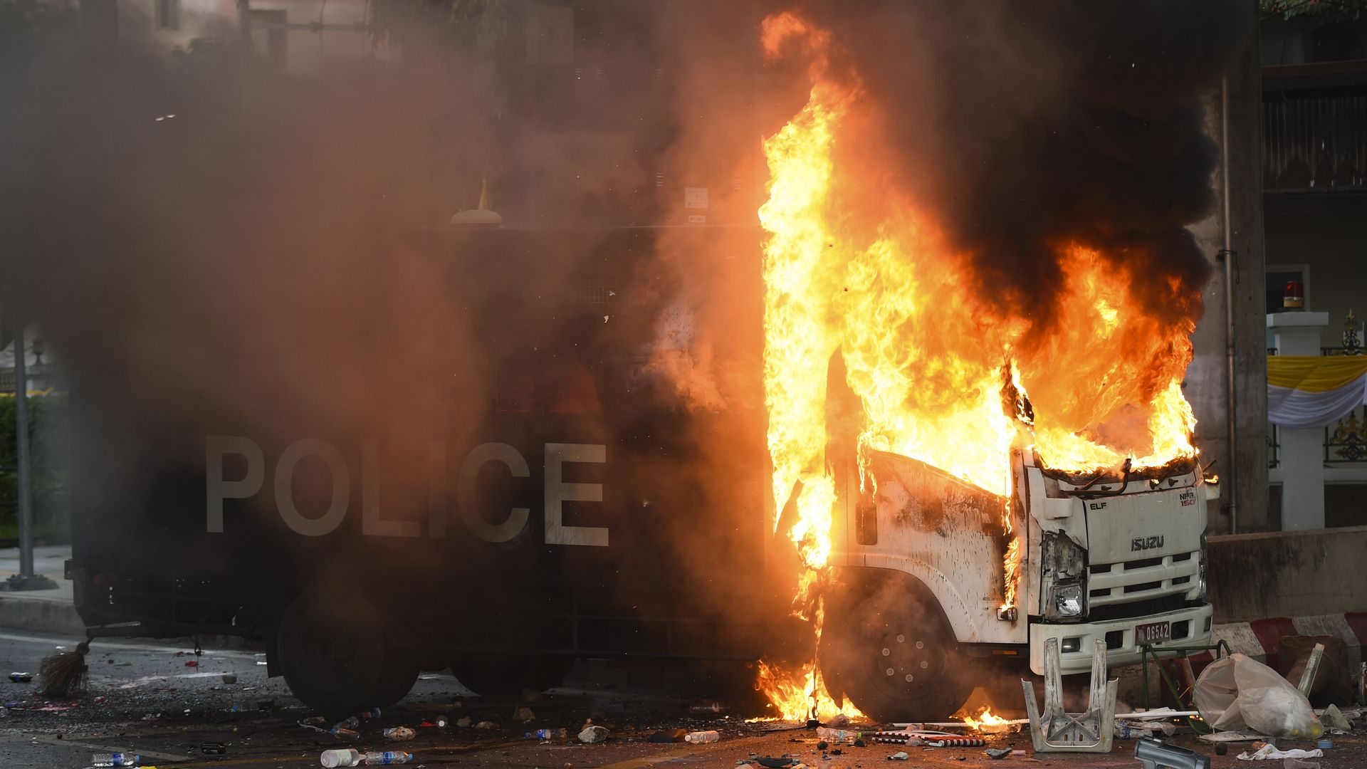 A burning police vehicle during the anti-government protester rally in Bangkok, Thailand, 07 August 2021.