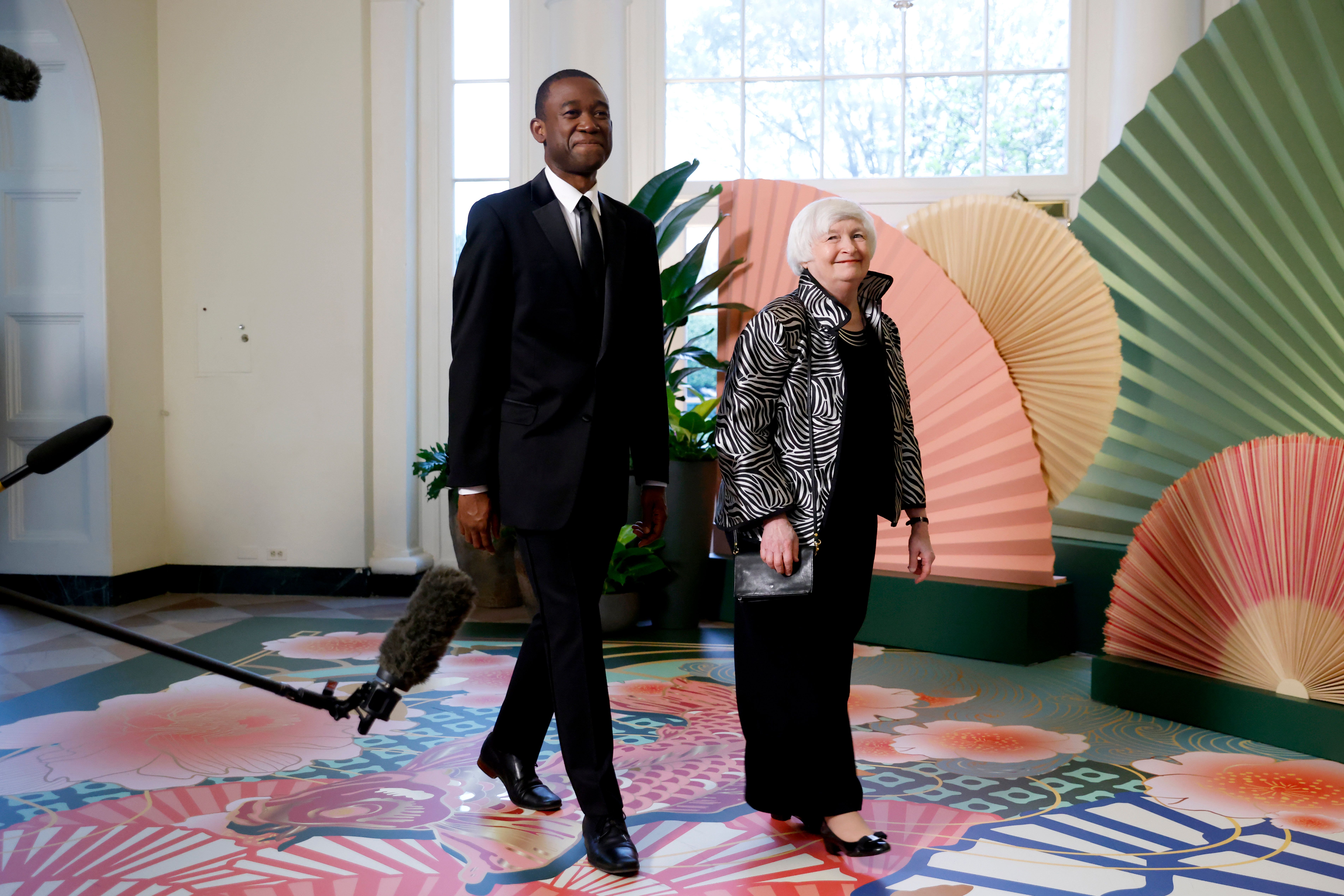 Wally Adeyemo, deputy US Treasury secretary, left, and Janet Yellen, US Treasury secretary, arrive to attend a state dinner in honor of Japanese Prime Minister Fumio Kishida hosted by US President Joe Biden and First Lady Jill Biden at the White House in Washington, DC, US, on Wednesday, April 10, 2024.