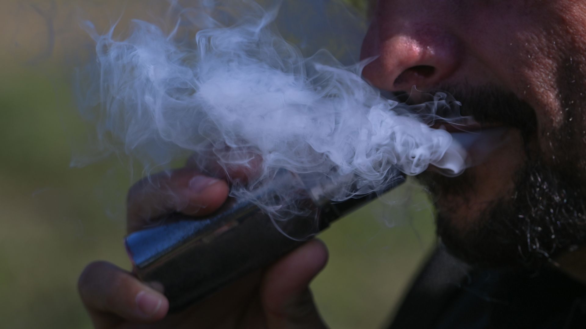 A man smokes an electronic cigarette. On Thursday, June 02, 2022, in Krakow, Poland. 