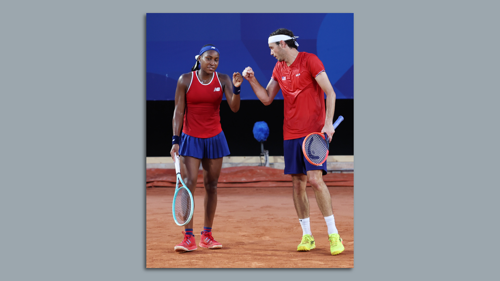 Taylor Fritz of Team United States (R) interacts with partner Coco Gauff of Team United States against Nadia Podoroska of Team Argentina and Maximo Gonzalez of Team Argentina during the Mixed Doubles first round match on day four of the Olympic Games Paris 2024 at Roland Garros on July 30.