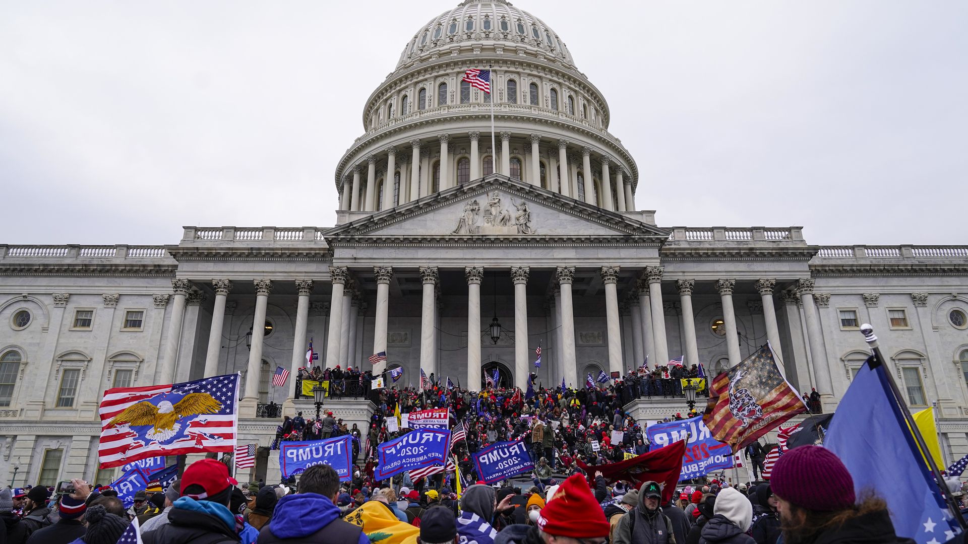 Photo of Trump supporters crowded on the steps to the U.S. Capitol building