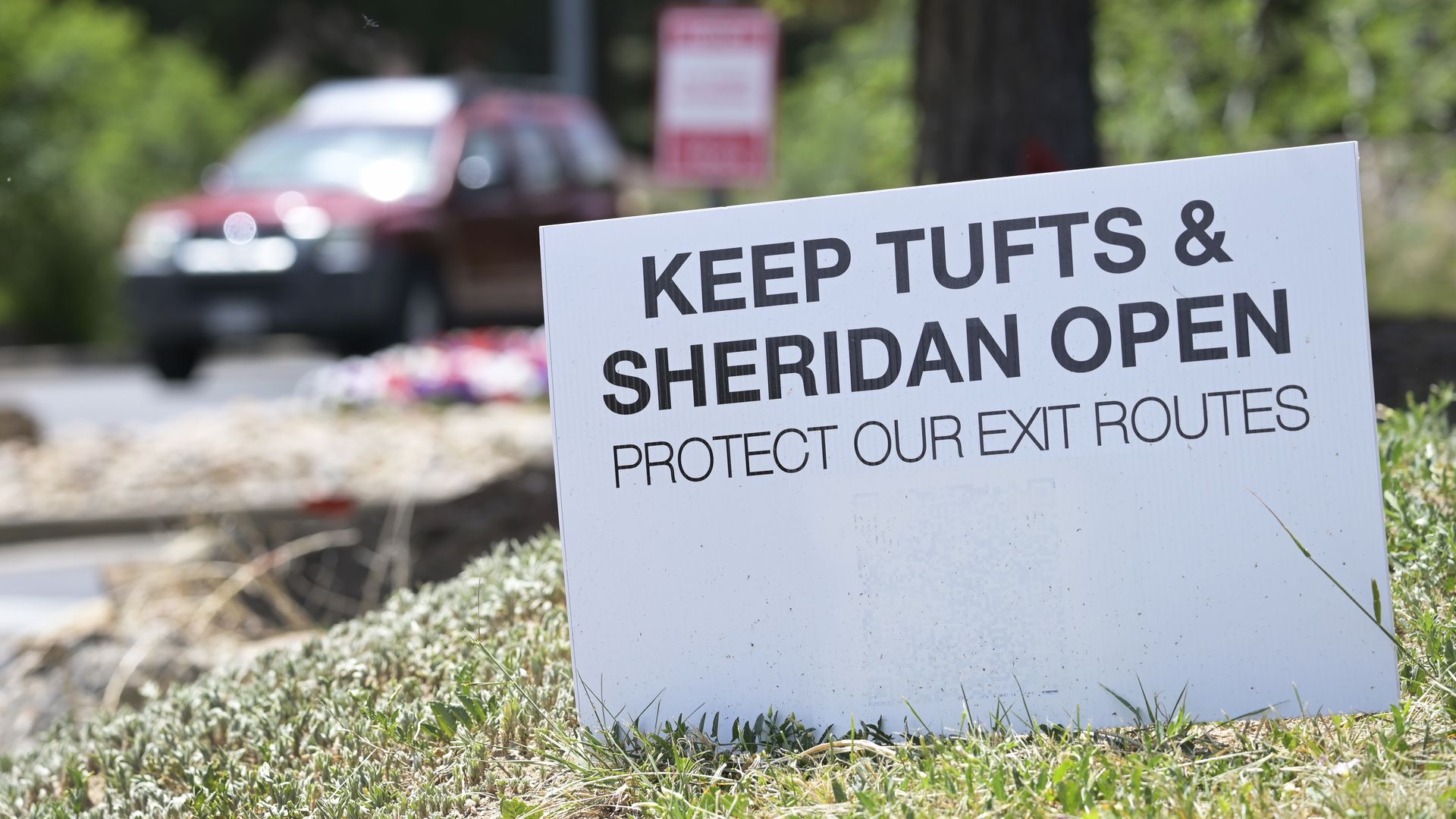 Keep Tufts & Sheridan Open sign at Town of Bow Mar South Sheridan Blvd. side entrance in Littleton, Colorado on Tuesday, June 16, 2026.