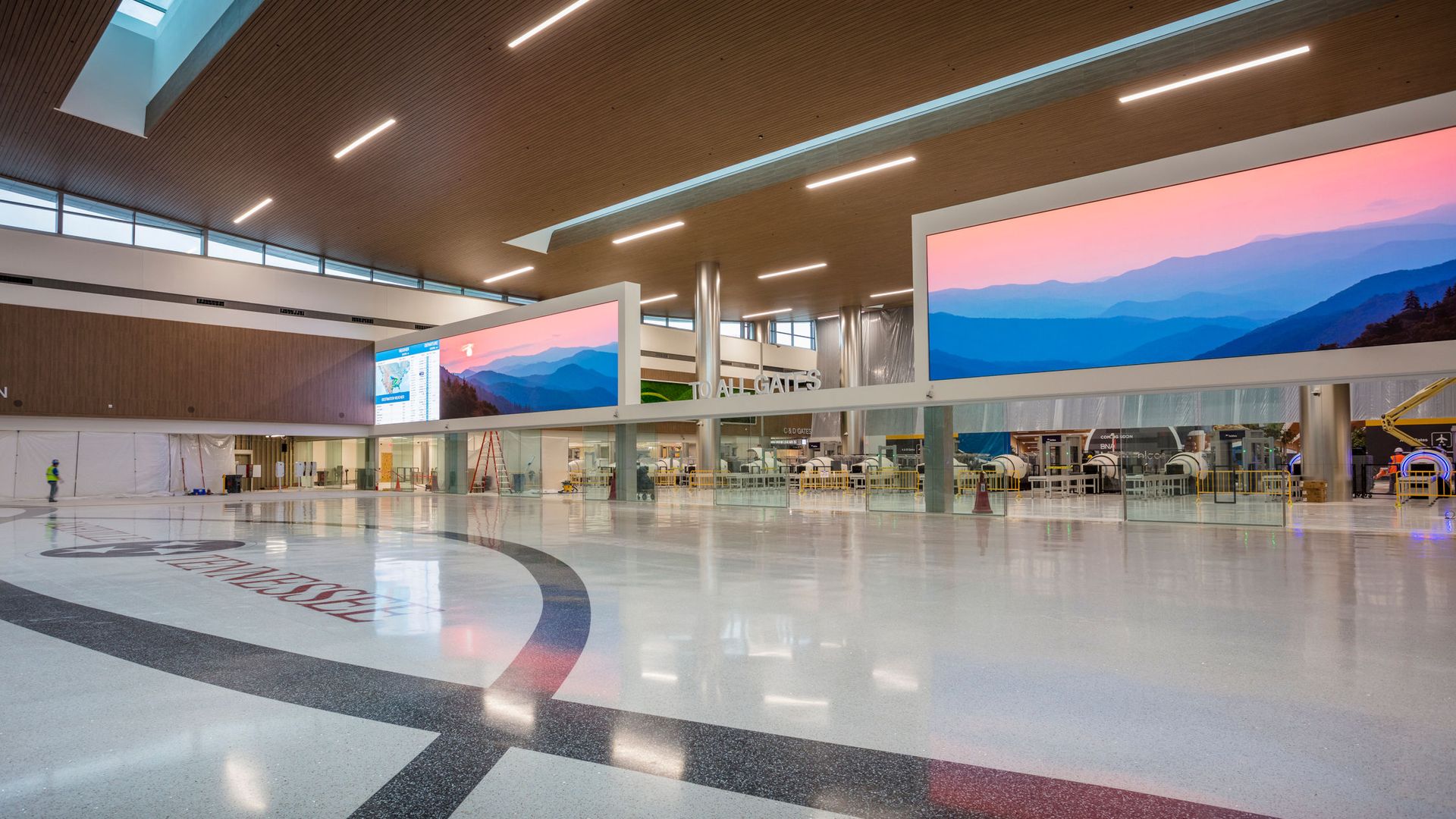 A large and open airport lobby.