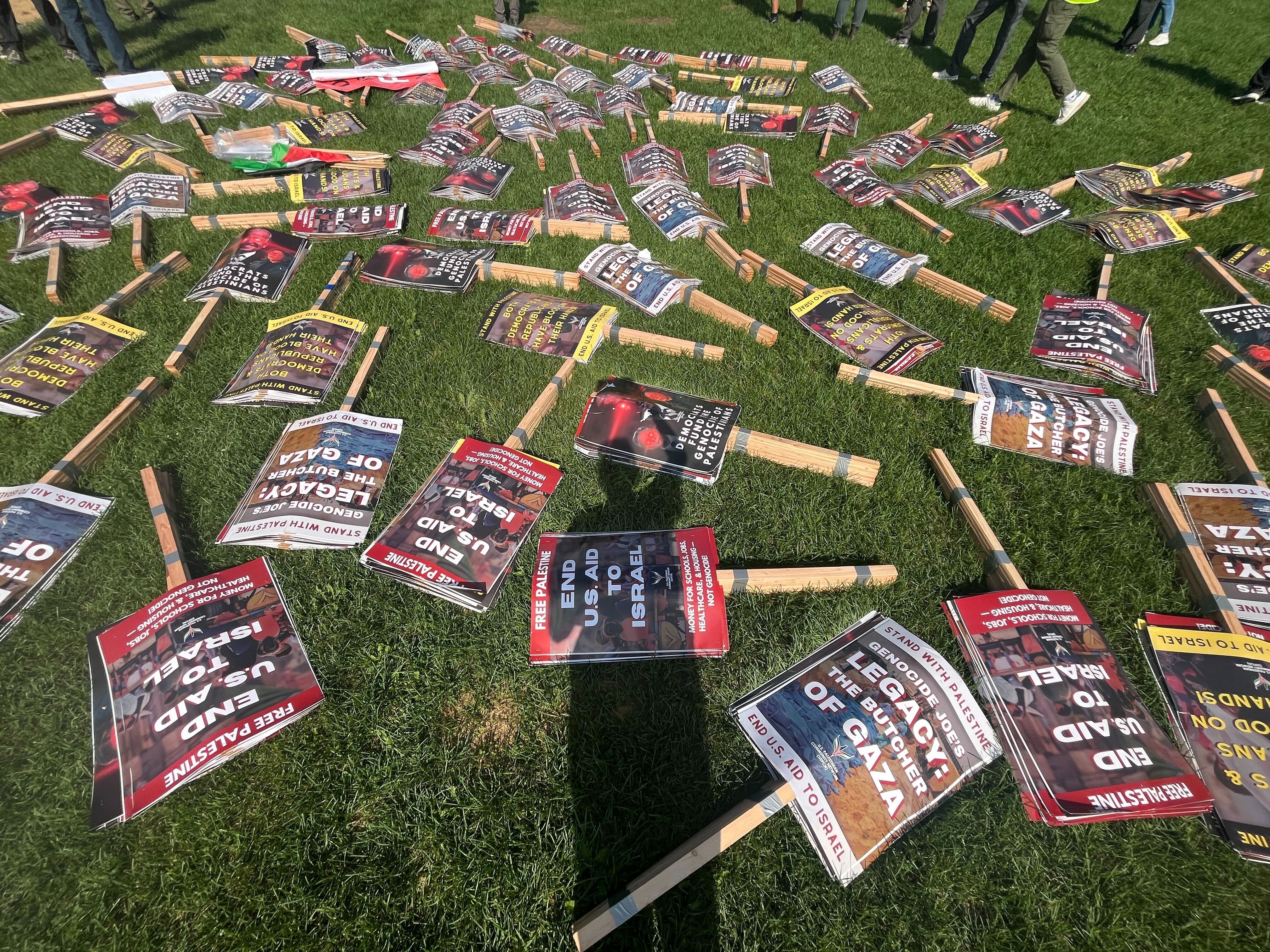 protest signs lay on the ground