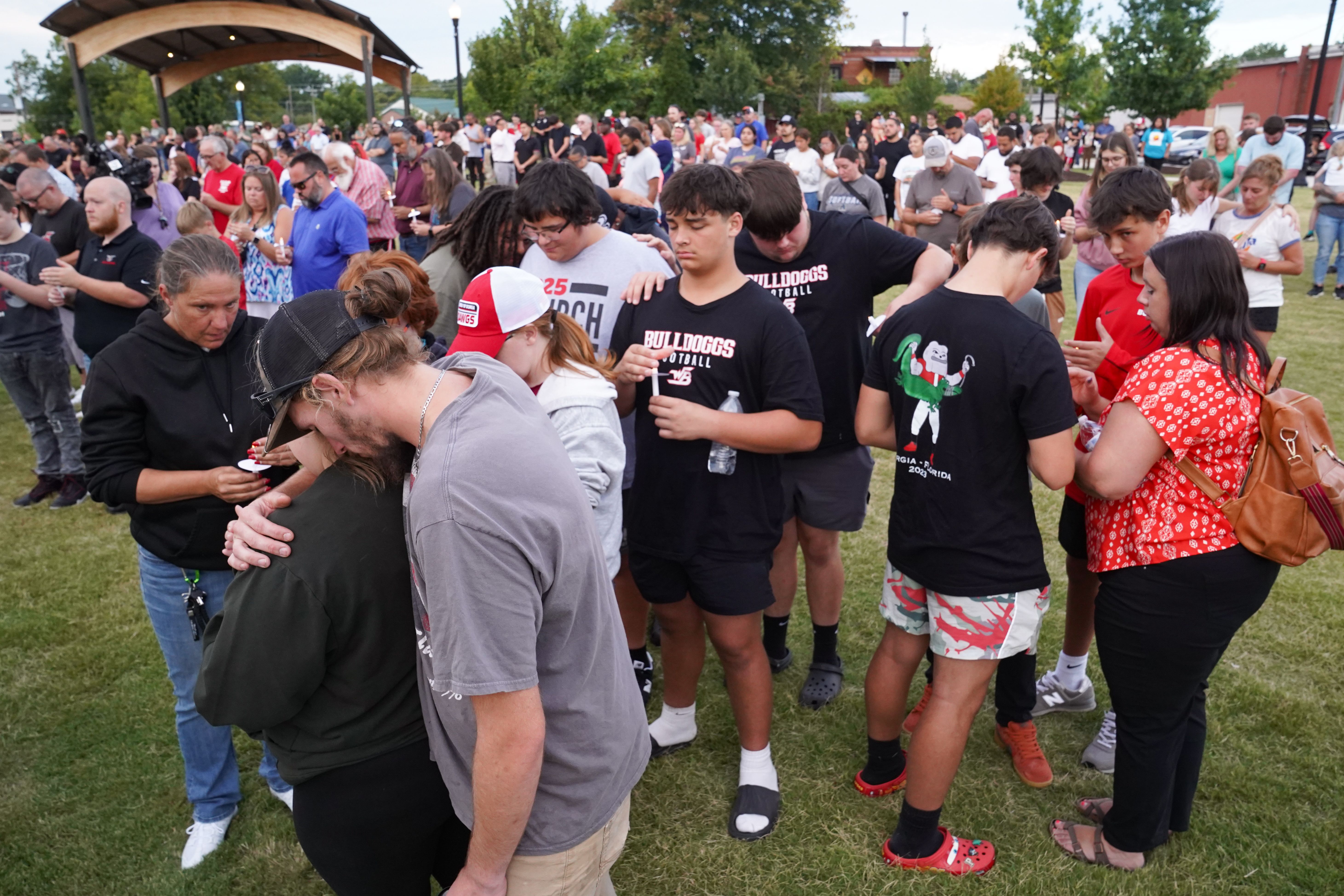 Students, faculty and community members gather for a vigil after a shooting at Apalachee High School on September 4, 2024 in Winder, Georgia. Four fatalities and multiple injuries have been reported, and a 14-year-old suspect is in custody according to authorities. 