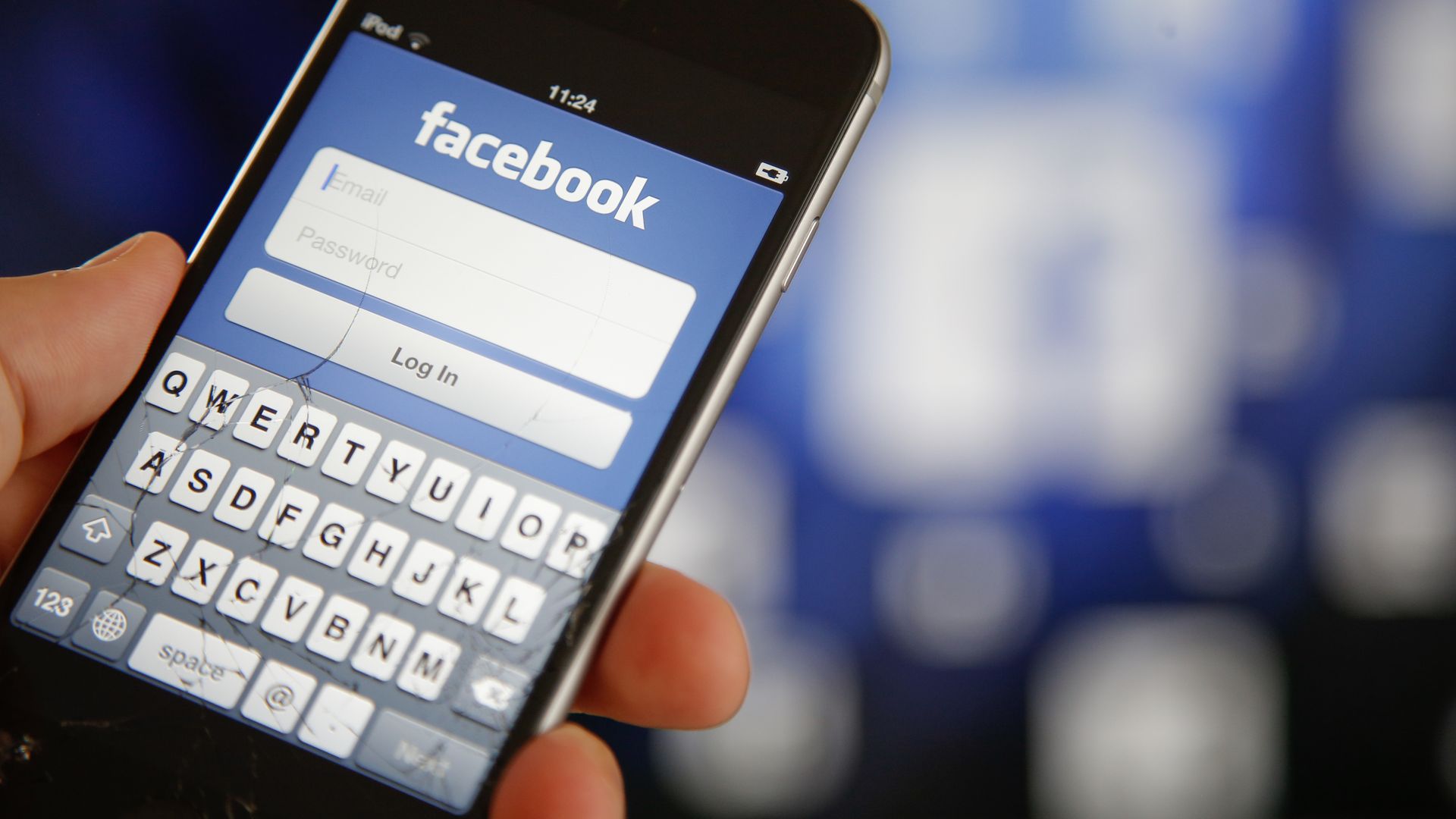 Smartphone screen with Facebook login interface 