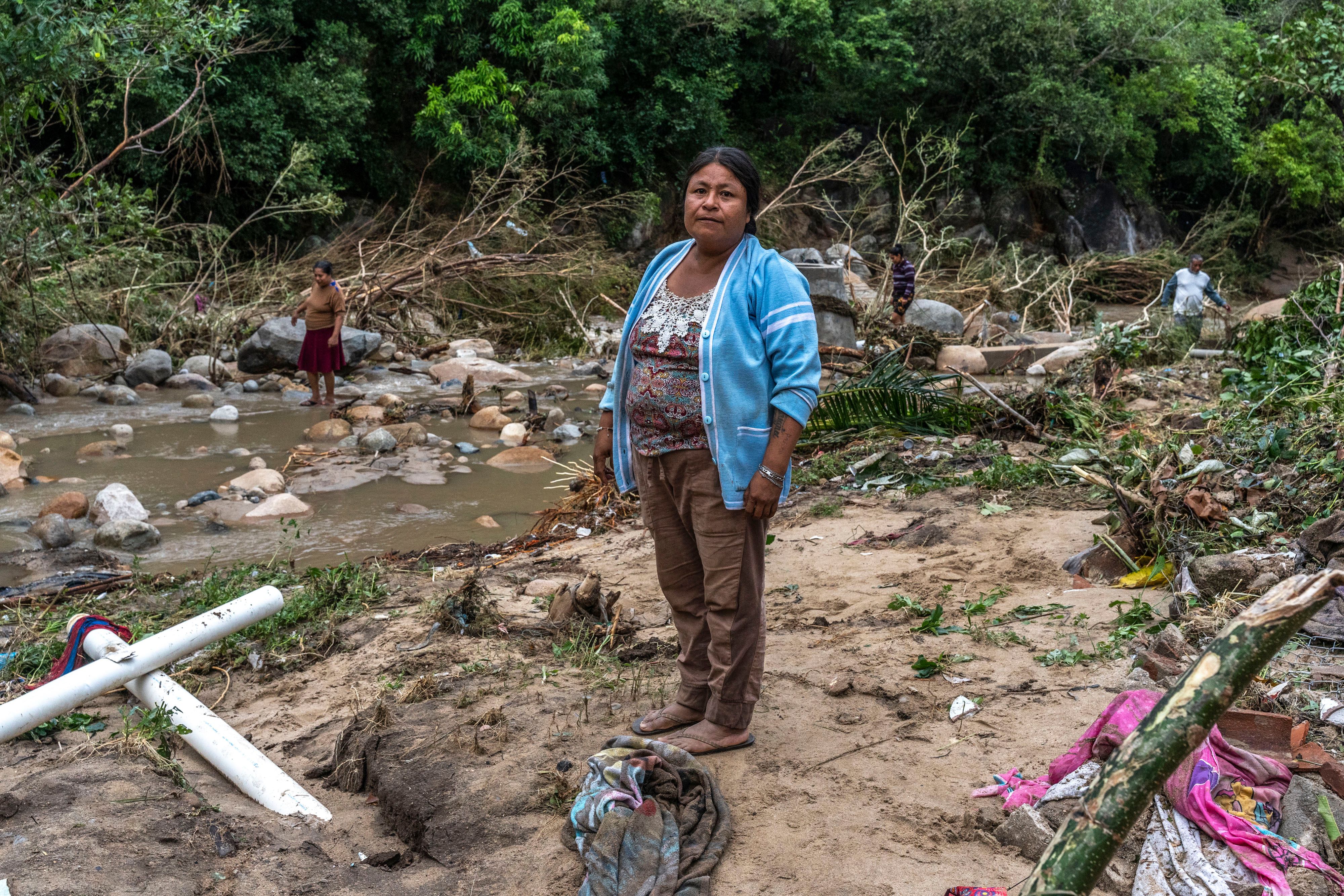 A resident surveys damage where a home once stood, in the aftermath of Hurricane Otis in Xaltianguis, Guerrero state, Mexico, on Thursday, Oct. 26, 2023