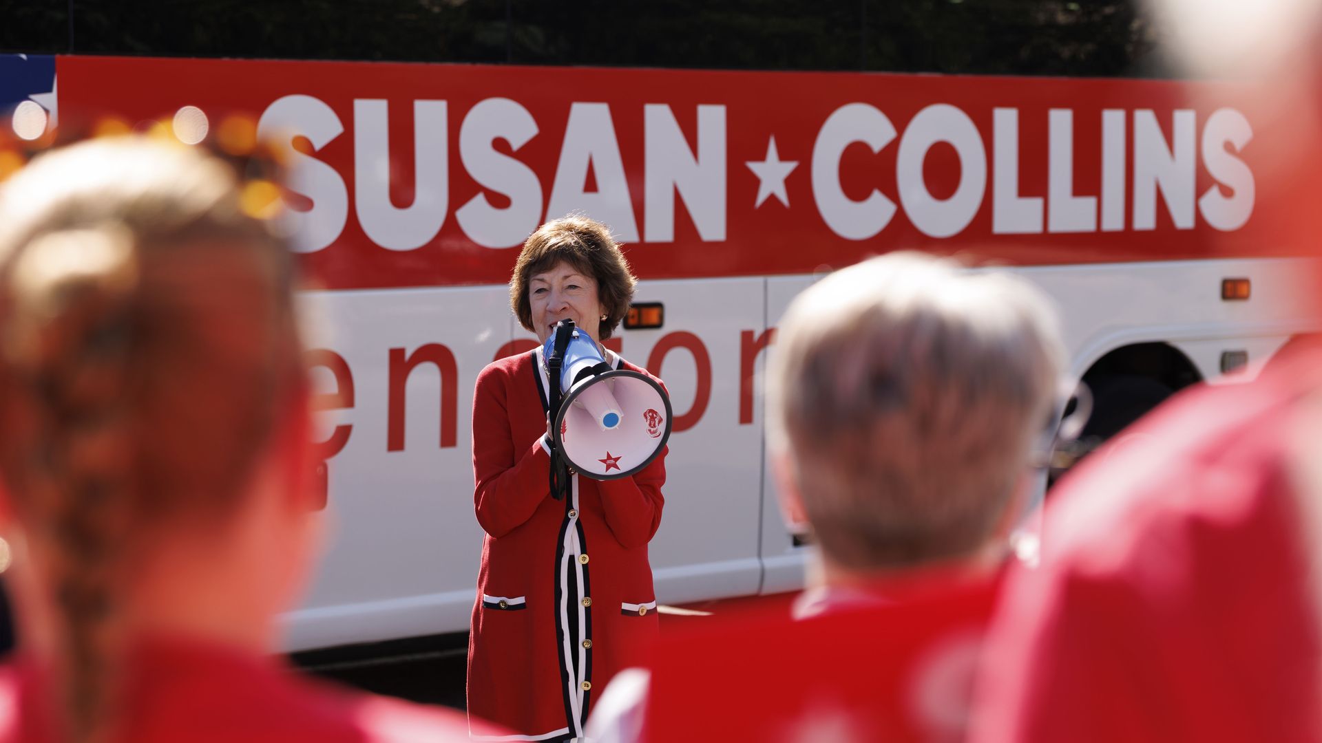Sen. Susan Collins greets supporters outside the Kittery Trading Post, the first stop on a campaign bus tour on Aug. 14 in Kittery, Maine. 
