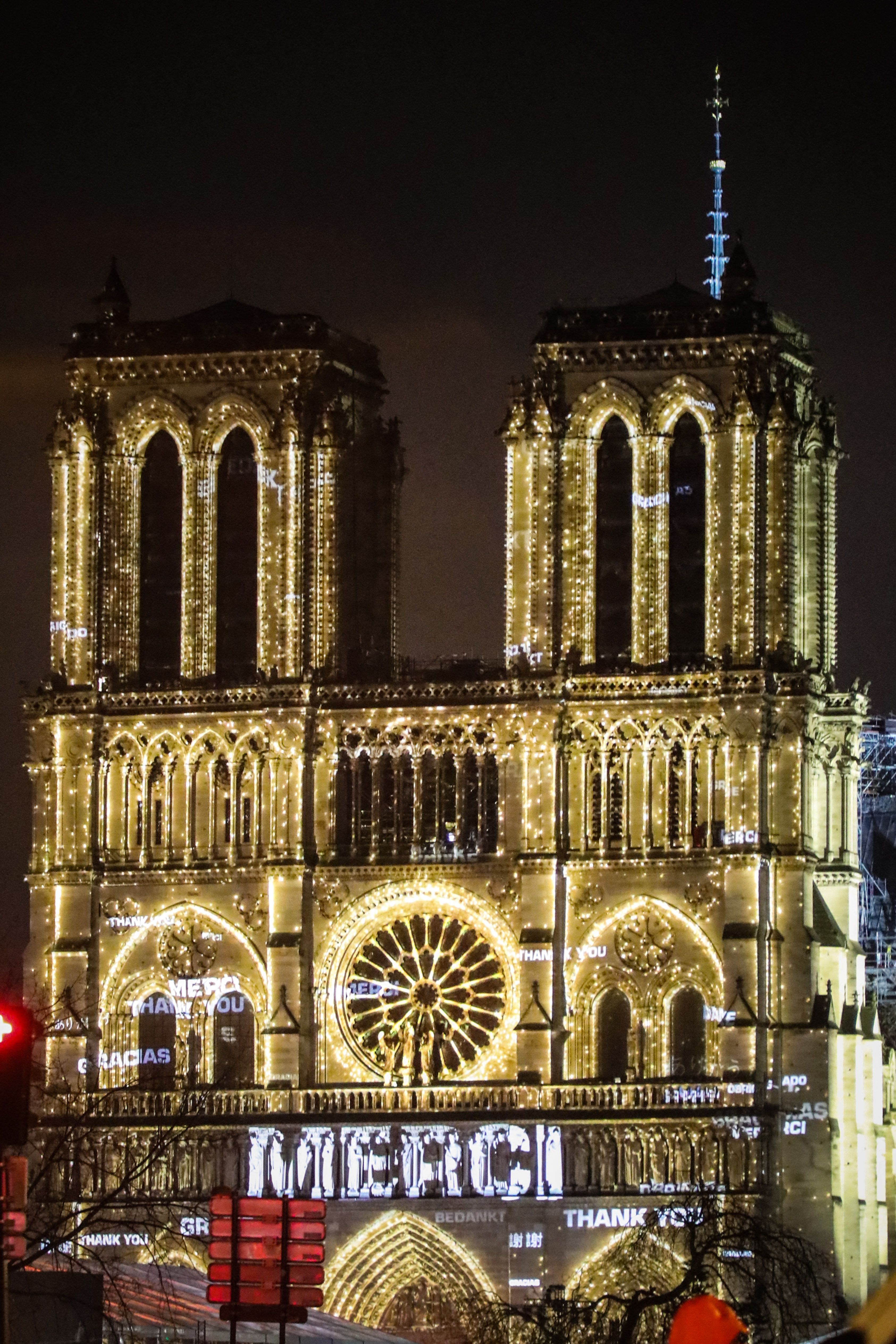 Light show with the word merci in every language projected onto the facade of Notre Dame Cathedral in Paris, France, on December 7, 2024. Ceremony for the reopening of Notre Dame Cathedral in Paris on December 7, 2024, by the archbishop of Paris, Laurent Ulrich. (Photo by Maeva Destombes / Hans Luca