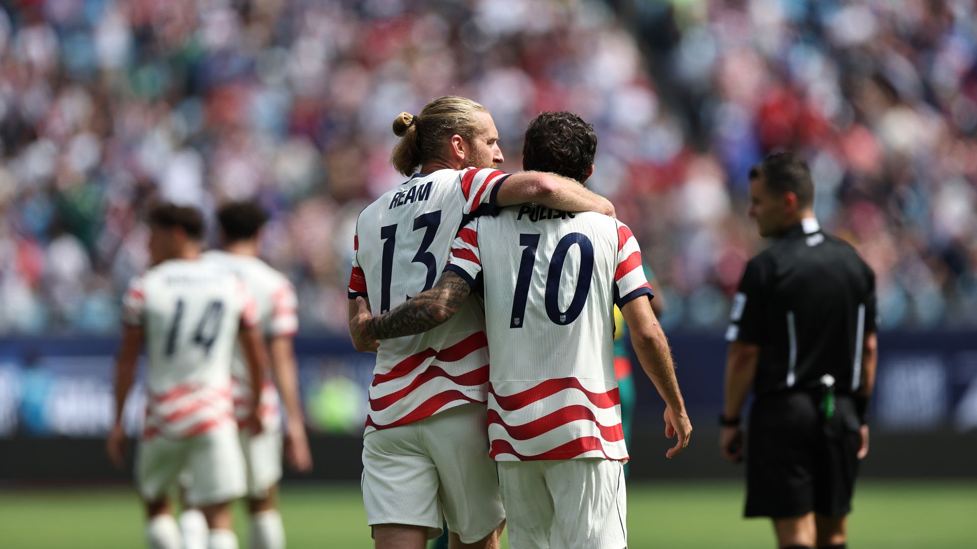 Christian Pulisic of United States celebrates with teammate Tim Ream after scoring his team's second goal during the international friendly match between United States and Senegal at Bank of America Stadium on May 31, 2026 in Charlotte, North Carolina. (Photo by Omar Vega/USSF/Getty Images)