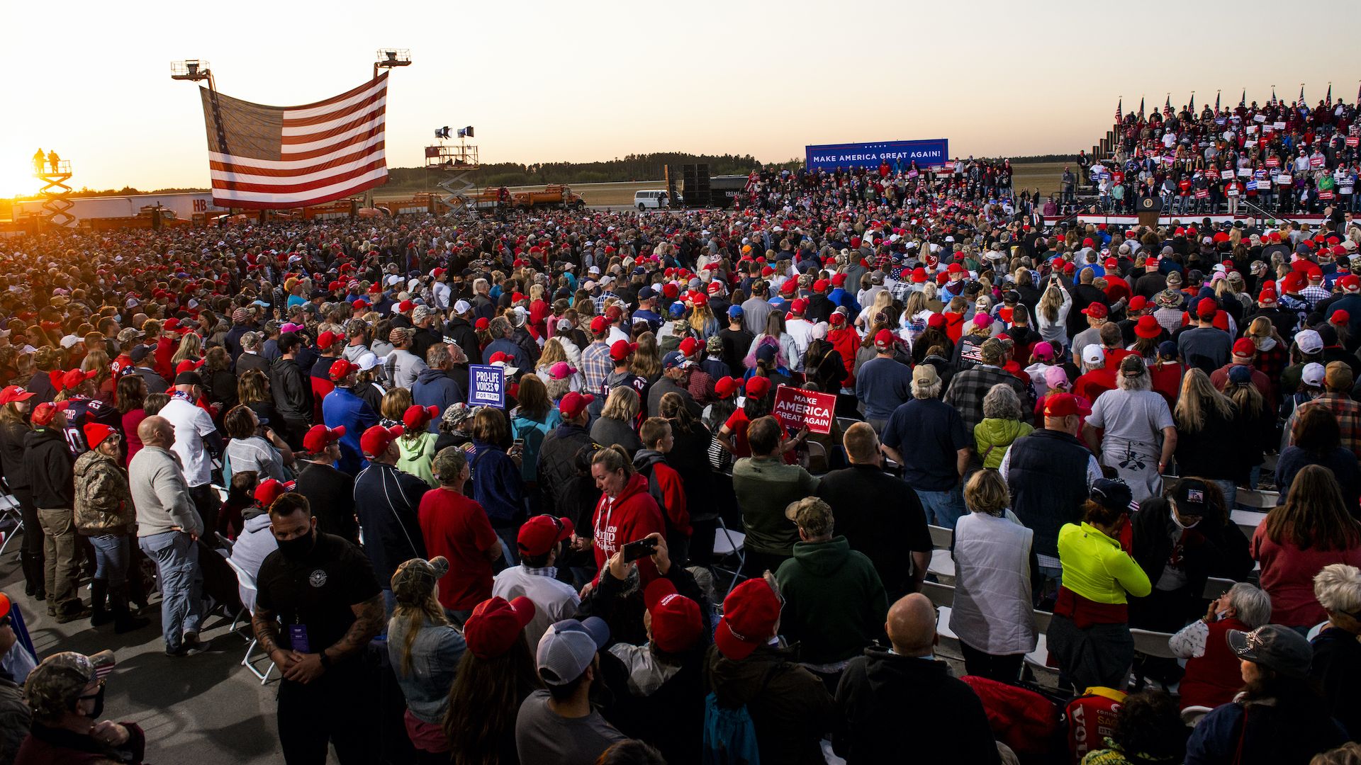 Photo of a packed crowd of people at a Trump event