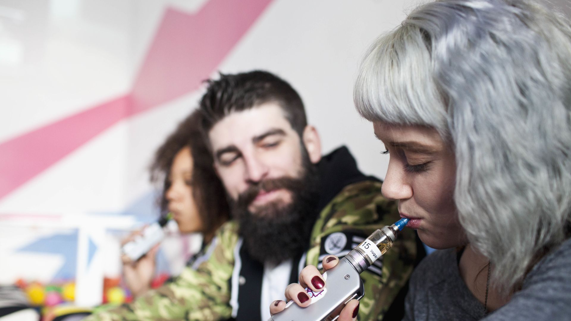 Young people vaping.