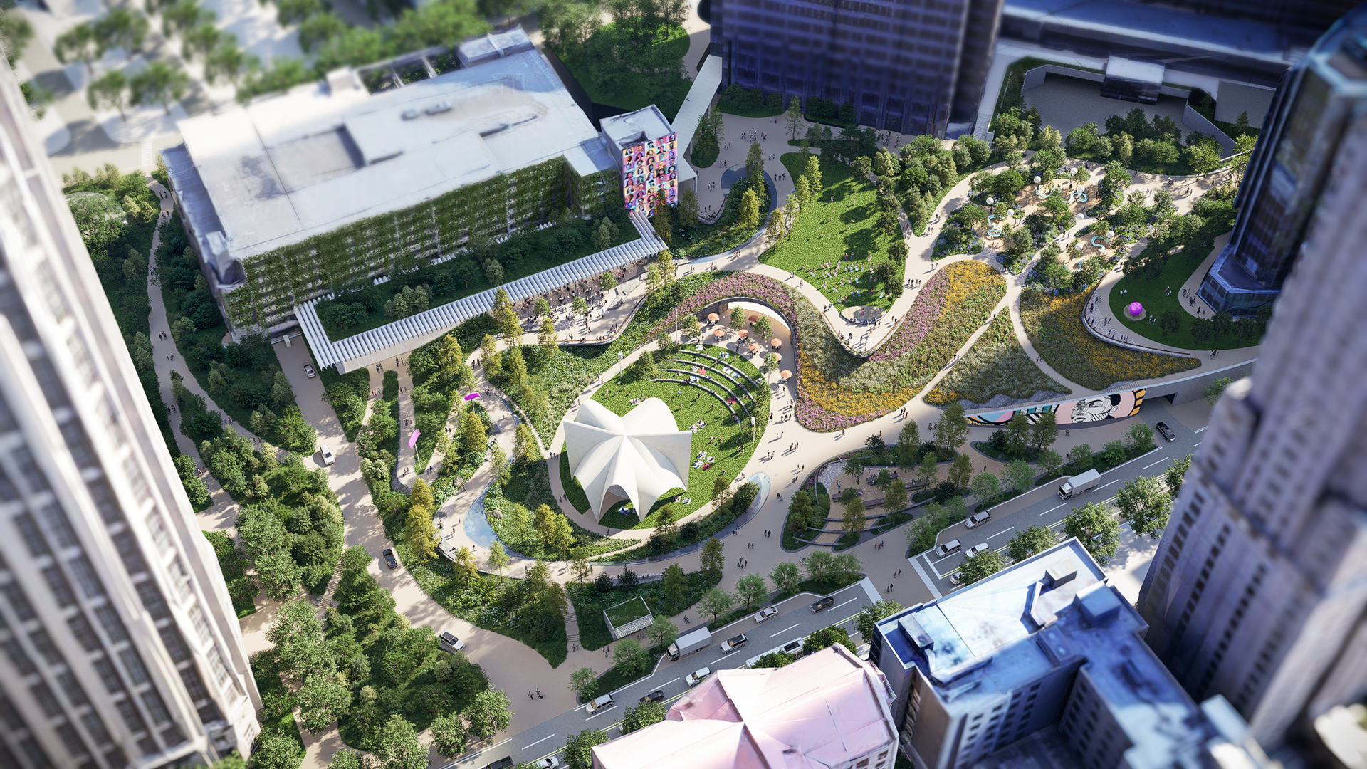 An aerial rendering of a green space with a large amphitheater and walking paths snaking through the park.