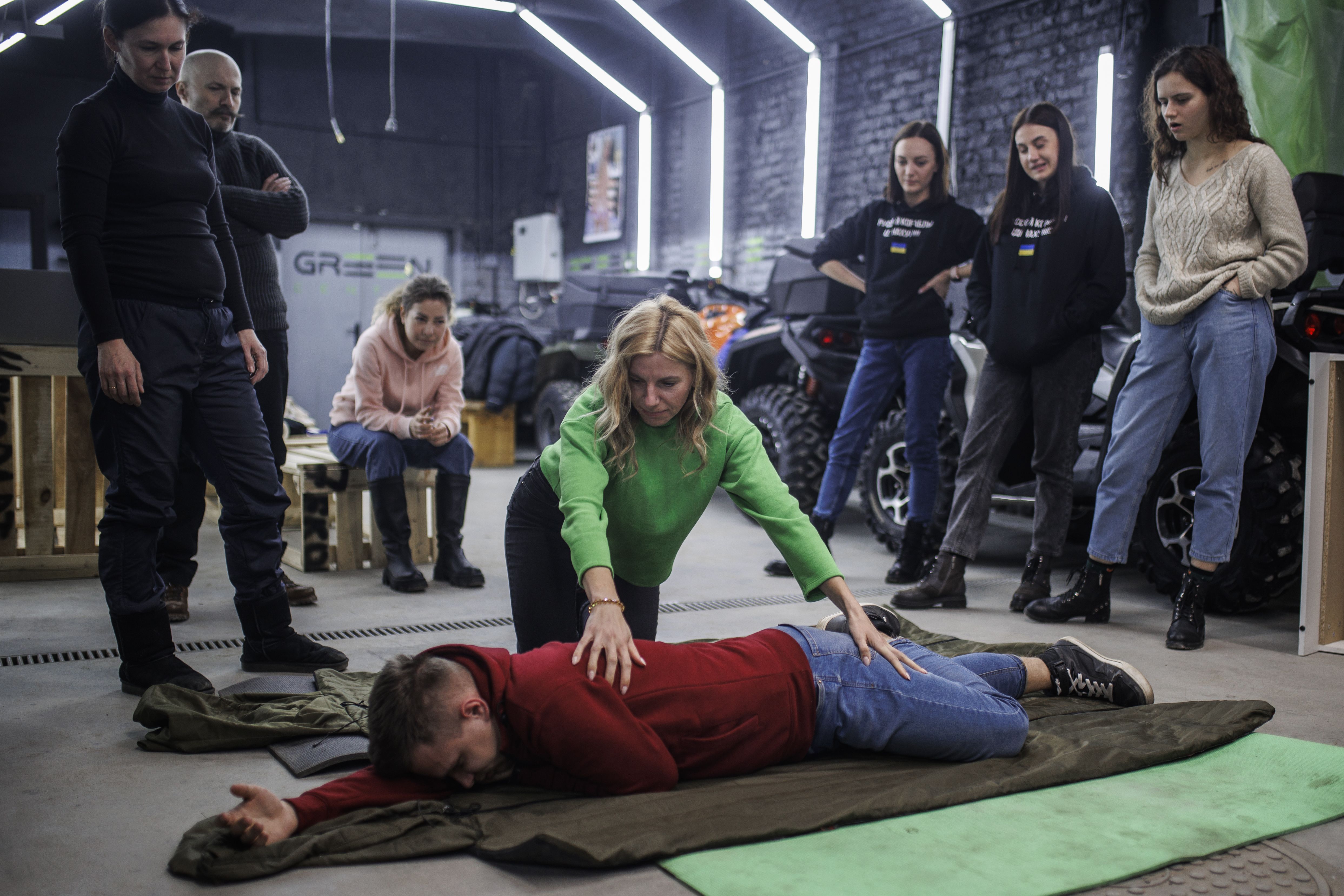 Ukrainians attend a first aid training at an underground room in Lviv, Ukraine amid Russian attacks on March 8.