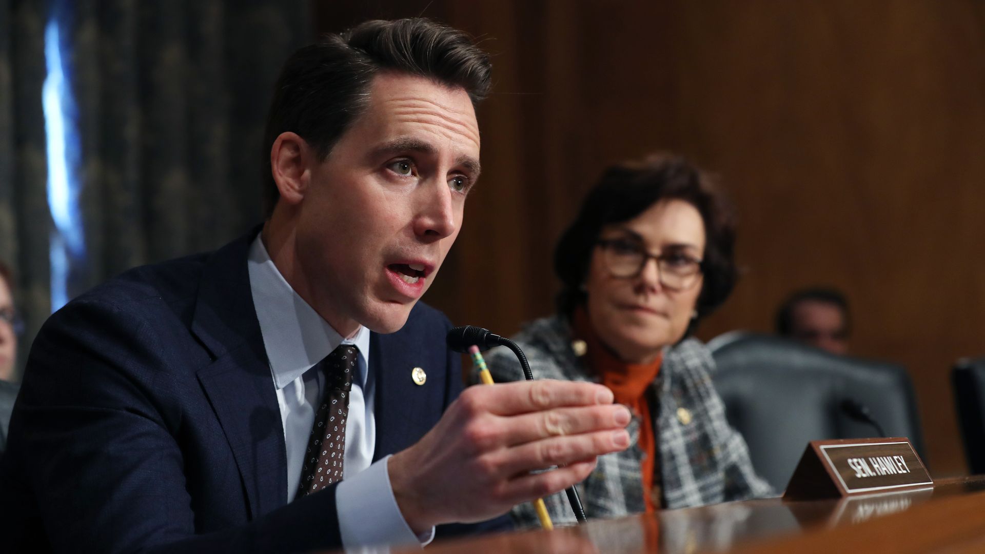 Photo of Sen. Josh Hawley as he speaks and gestures during a Senate hearing