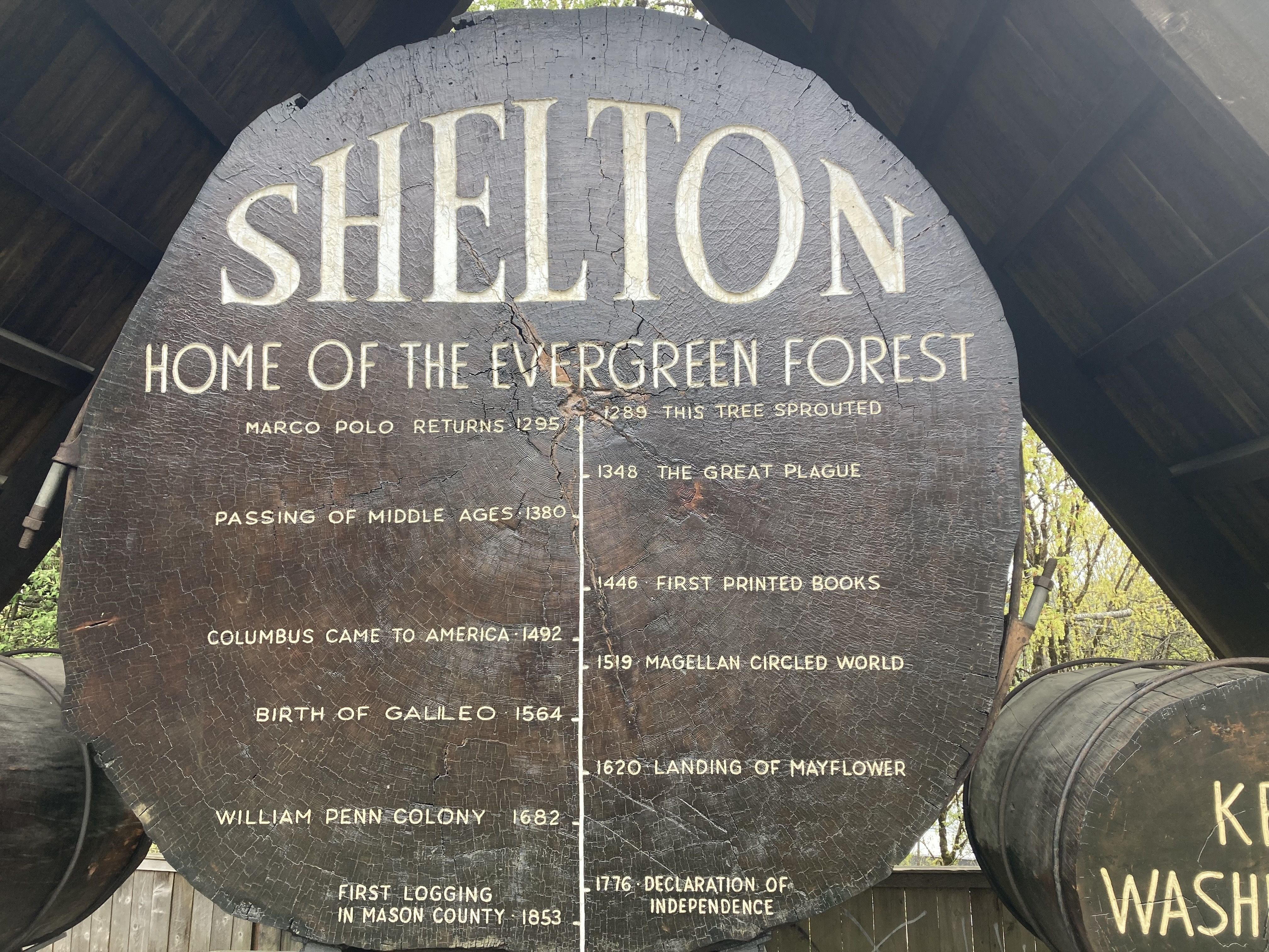 A slice of a 600 year-old tree welcomes visitors to Shelton in Washington. 