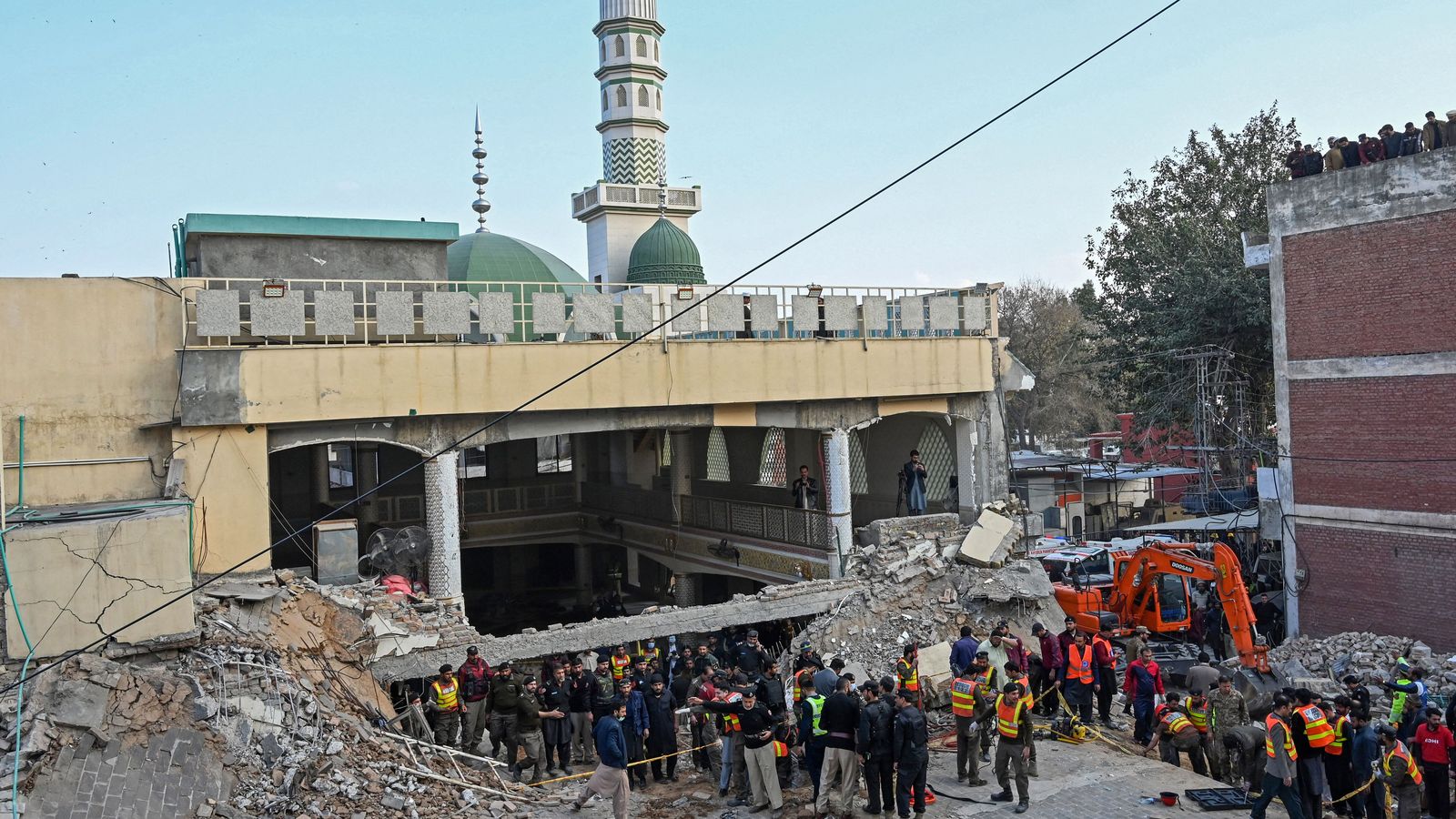 Death Toll From Suicide Bombing At Mosque In Pakistan Climbs To 100