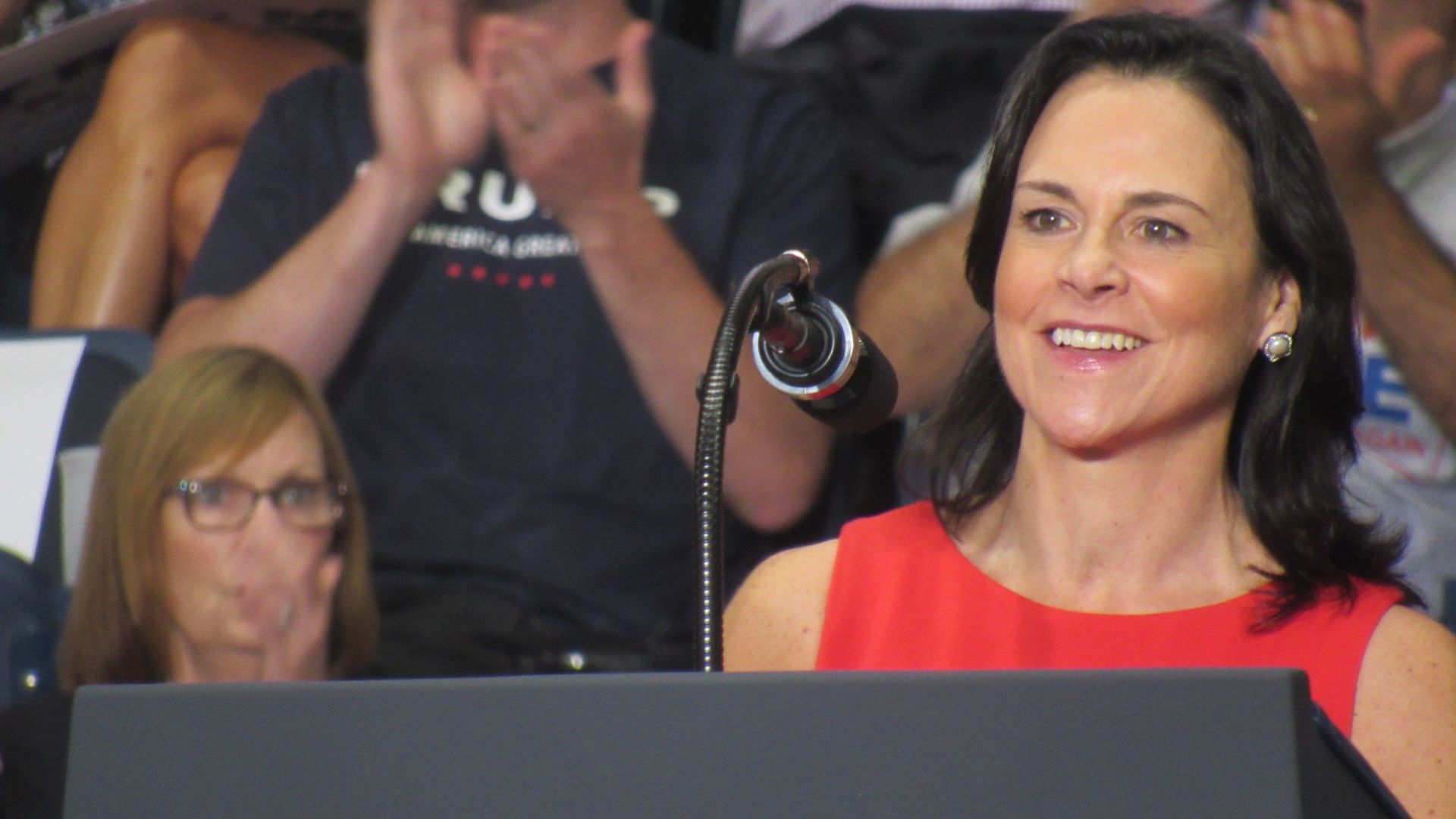 Jane Timken is seen at the lectern during a 2017 Trump rally.