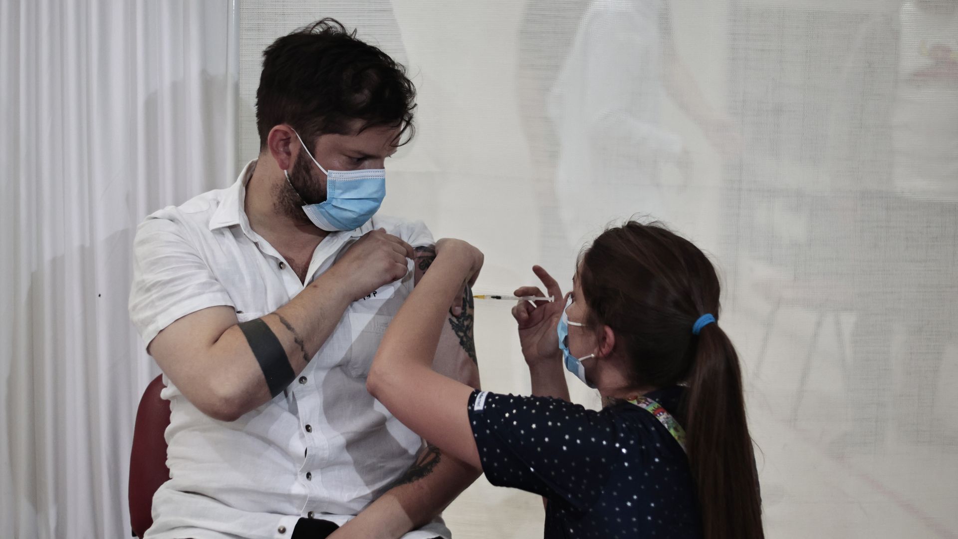 Chile’s president-elect Gabriel Boric gets his booster shot, Dec. 24. The country was among the first to administer them.
