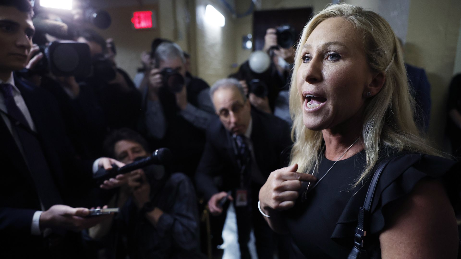 Rep. Marjorie Taylor Greene (R-GA) talks with reporters after leaving a Republican caucus on January 03, 2023 in Washington, DC.