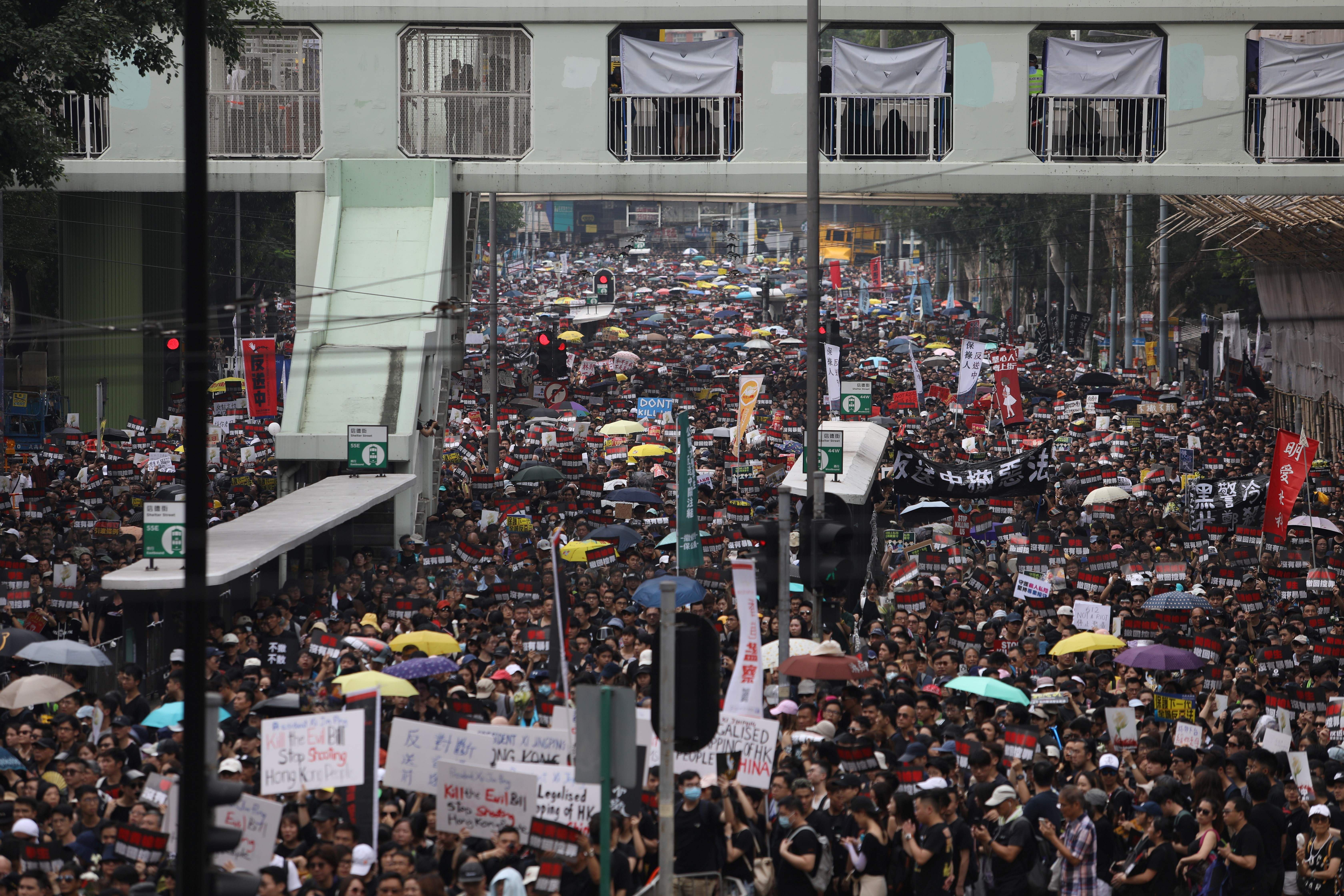  Thousands of protesters take part in a new rally against a controversial extradition law proposal in Hong Kong on June 16, 2019.