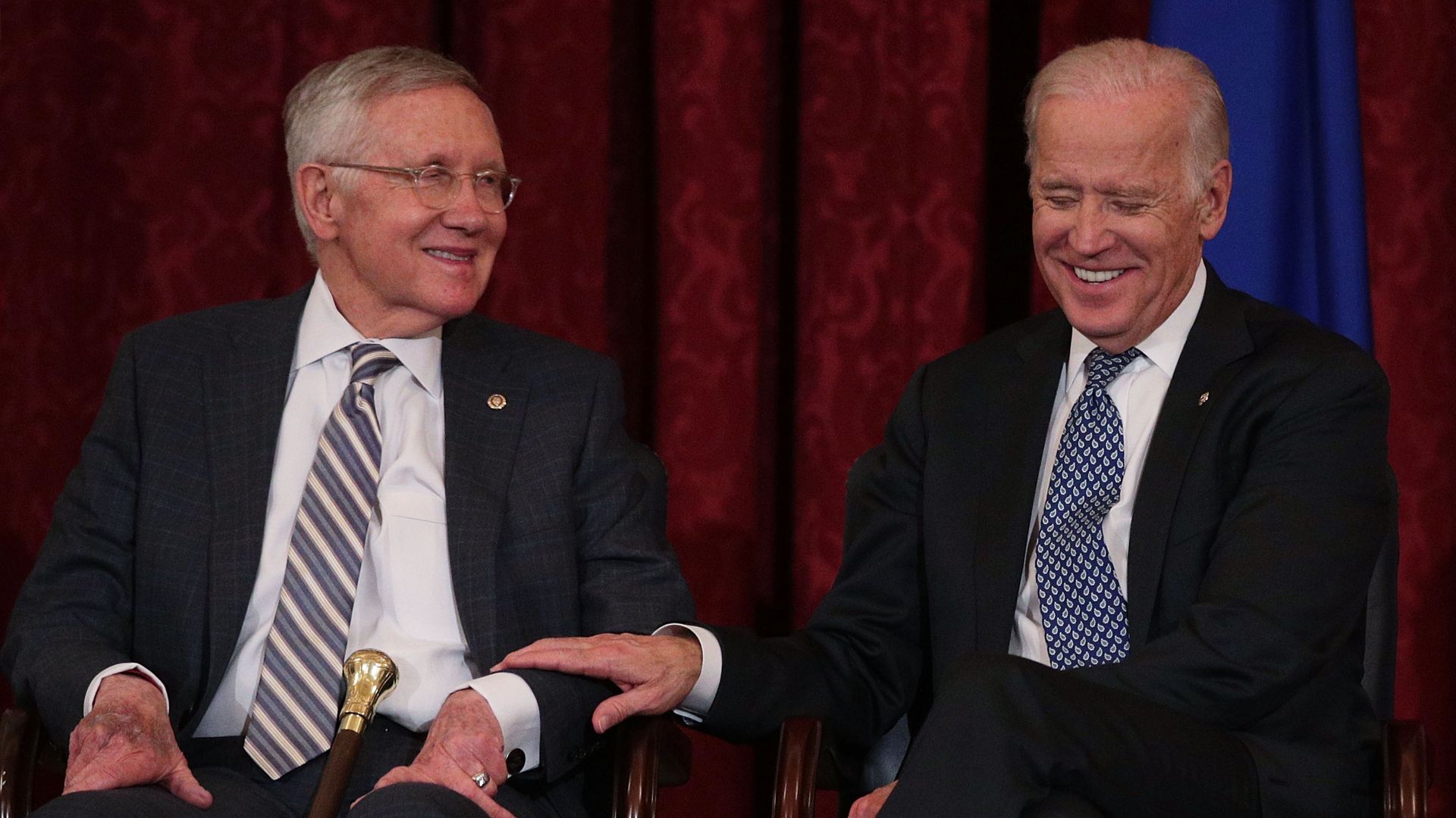Then-Senate Minority Leader Sen. Harry Reid shares a moment with then-Vice President Joe Biden December 8, 2016 on Capitol Hill.