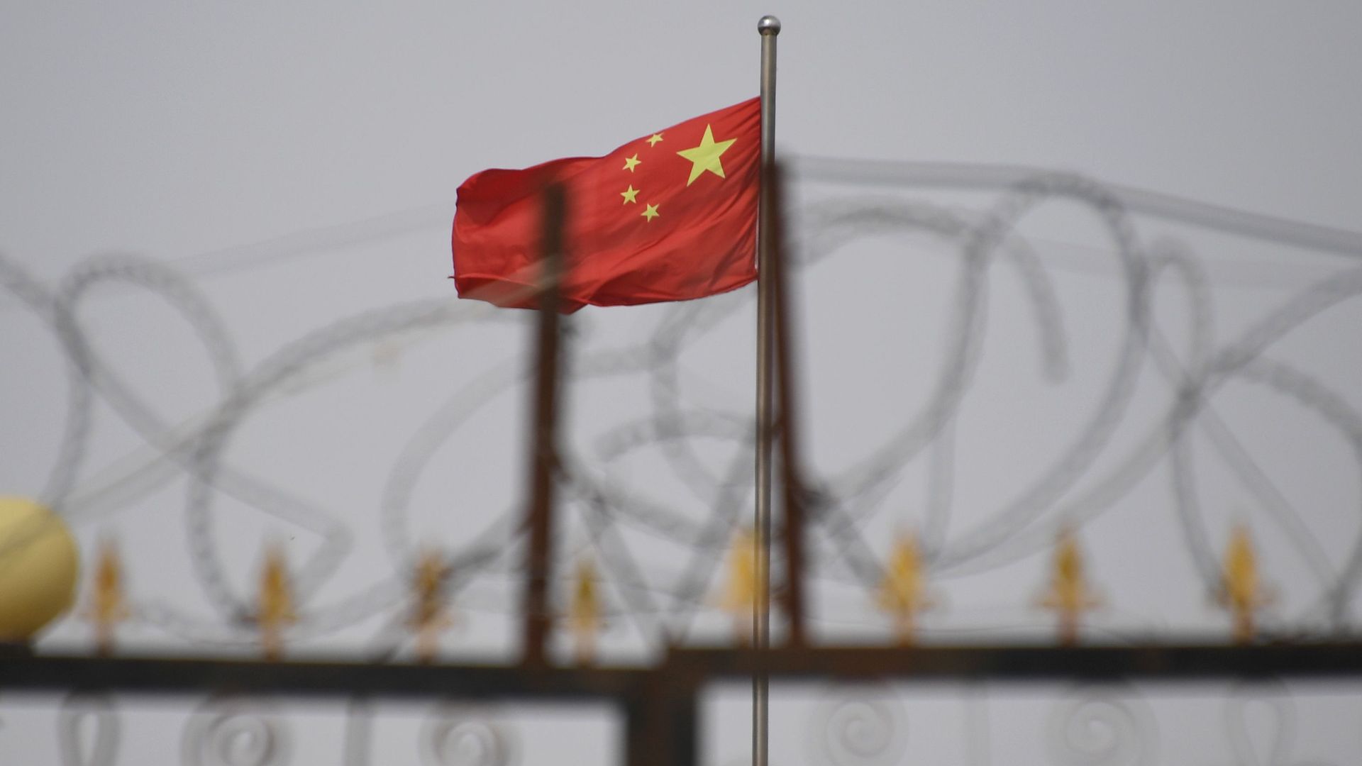 photo of Chinese flag and fencing