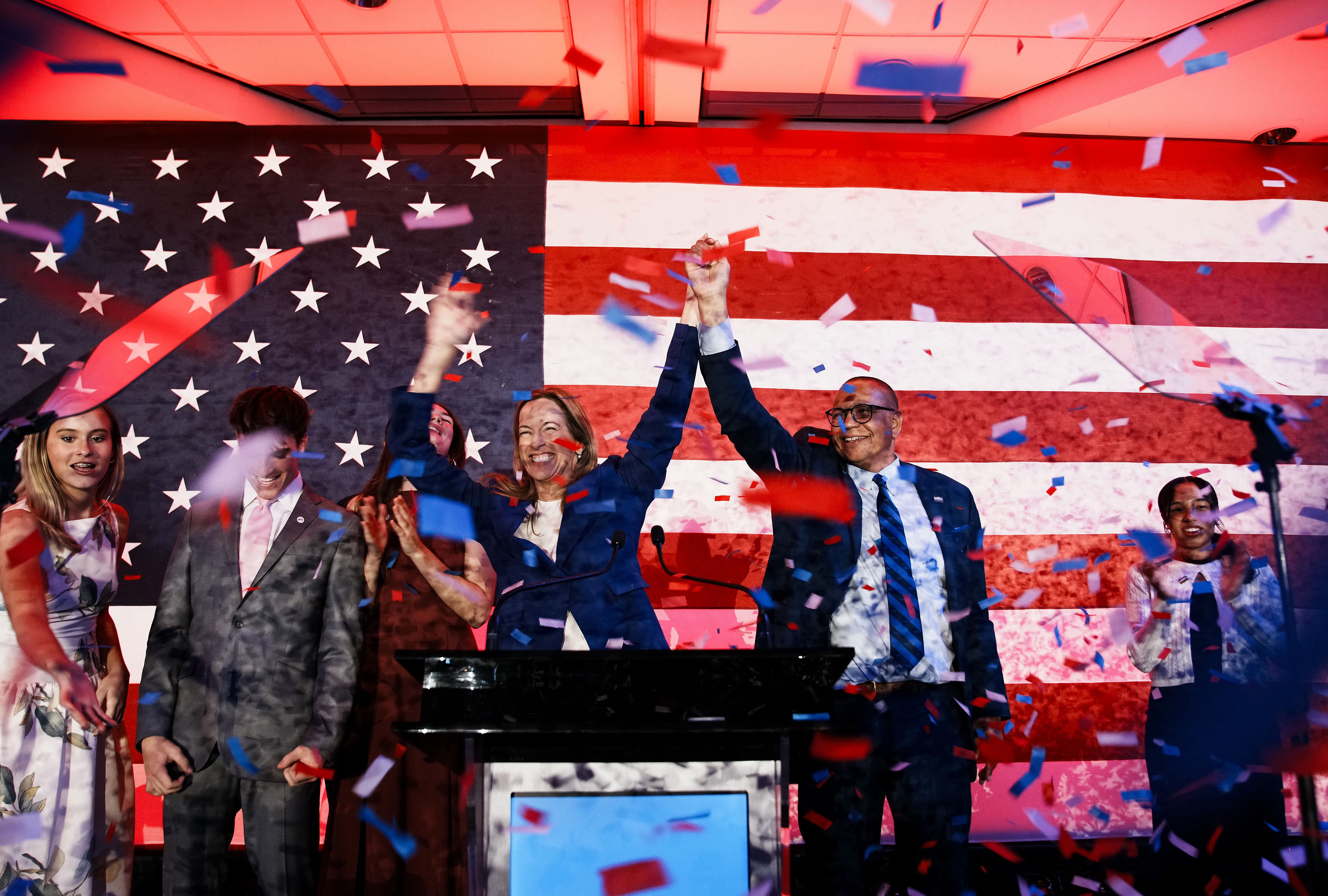 New Jersey Gov.-elect Mikie Sherrill celebrates with running mate Dale Caldwell last night.